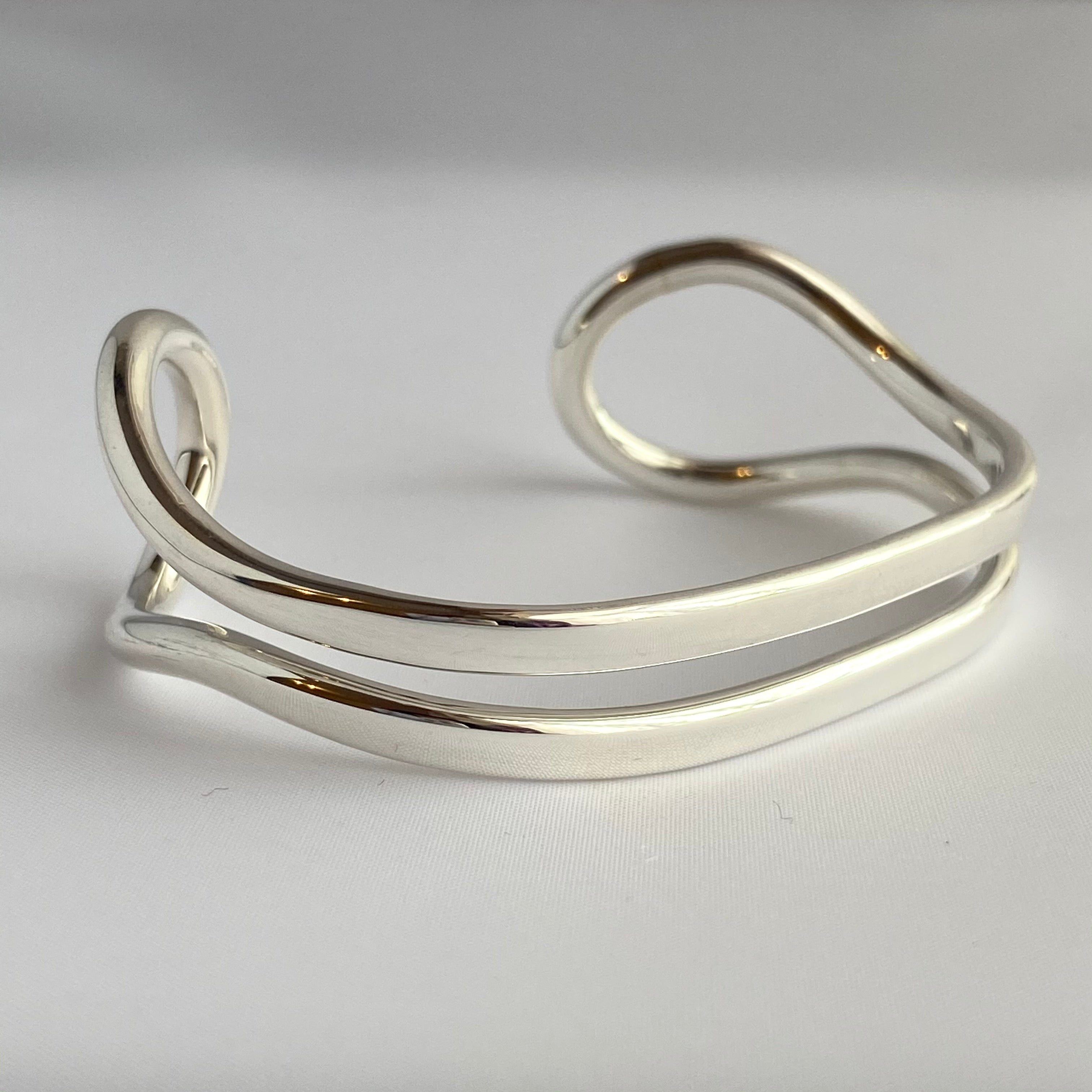 Sterling Silver Cuff with Two Flat Curving Silver Bands