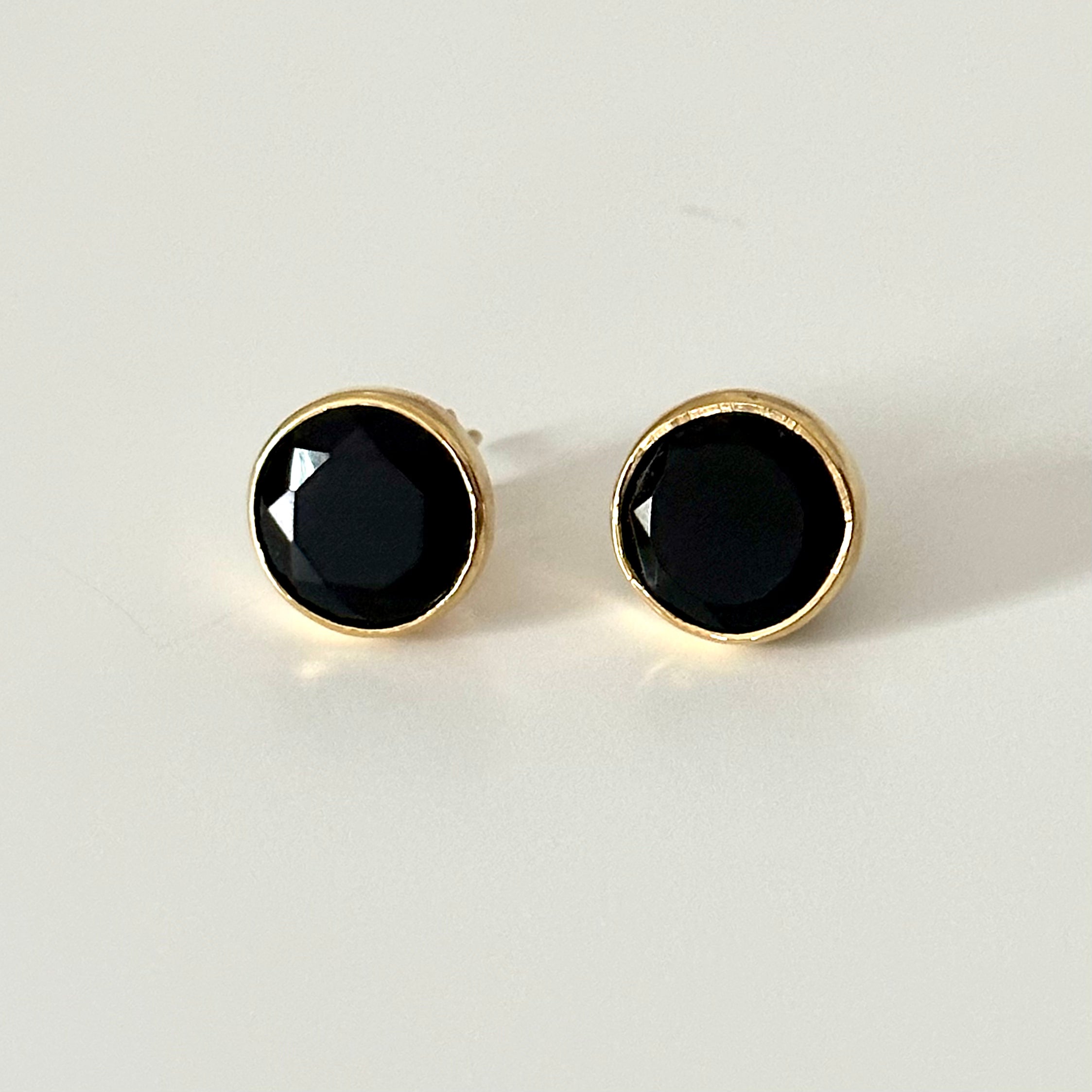 Black Onyx Studs in Gold Plated Sterling Silver with a Round Faceted Gemstone - Milina London