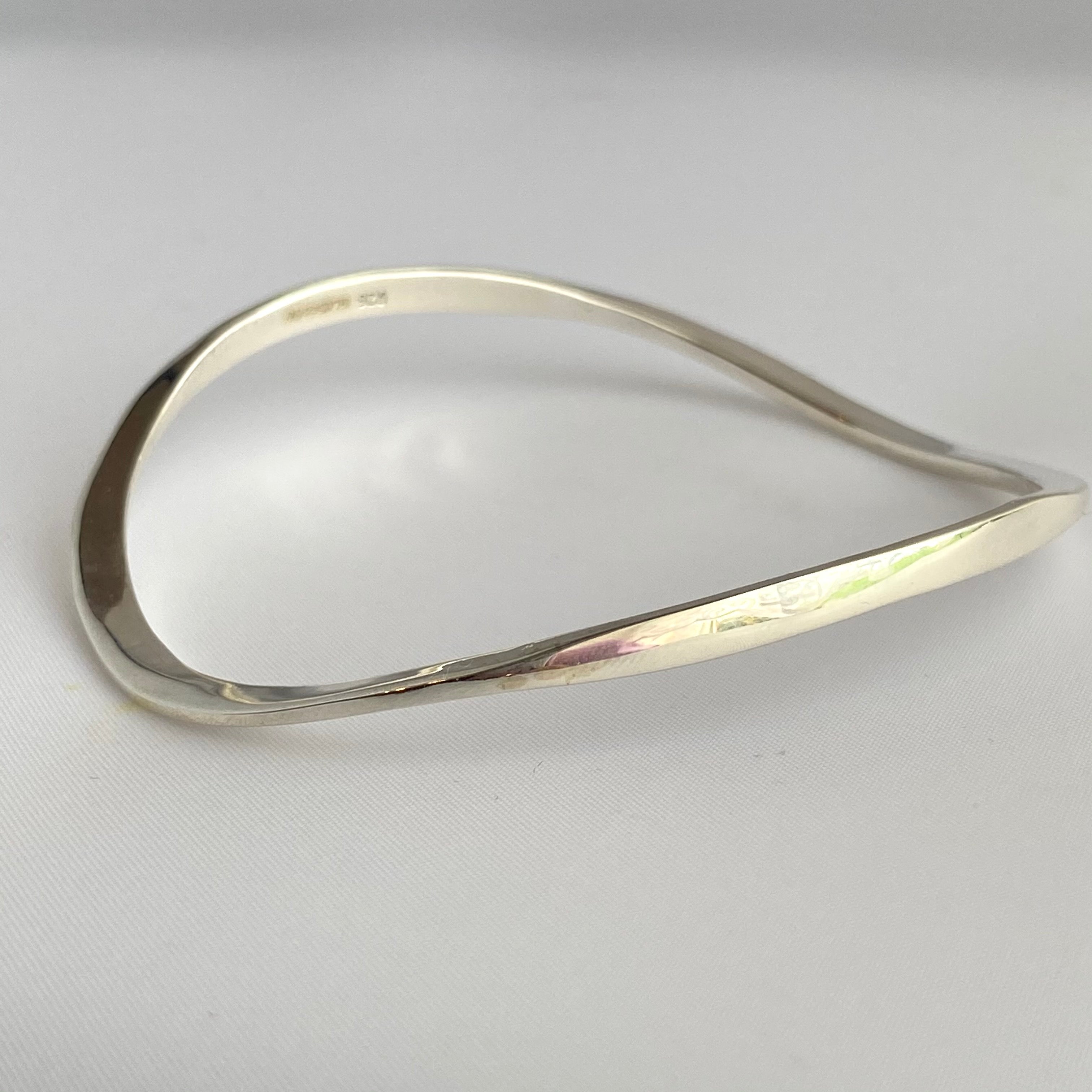 Sterling Silver Wavy Bangle with a Slightly Triangular Shape