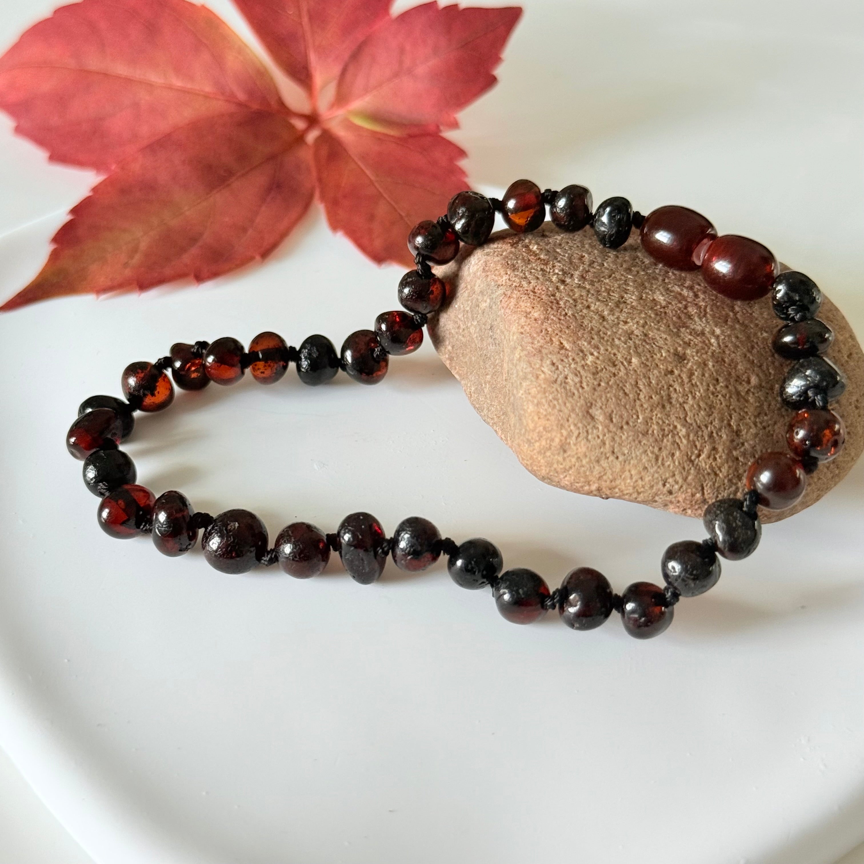 Dark Cherry and Garnet Toned Genuine Baltic Amber Baroque Stacking Bracelet with a secure screw mechanism