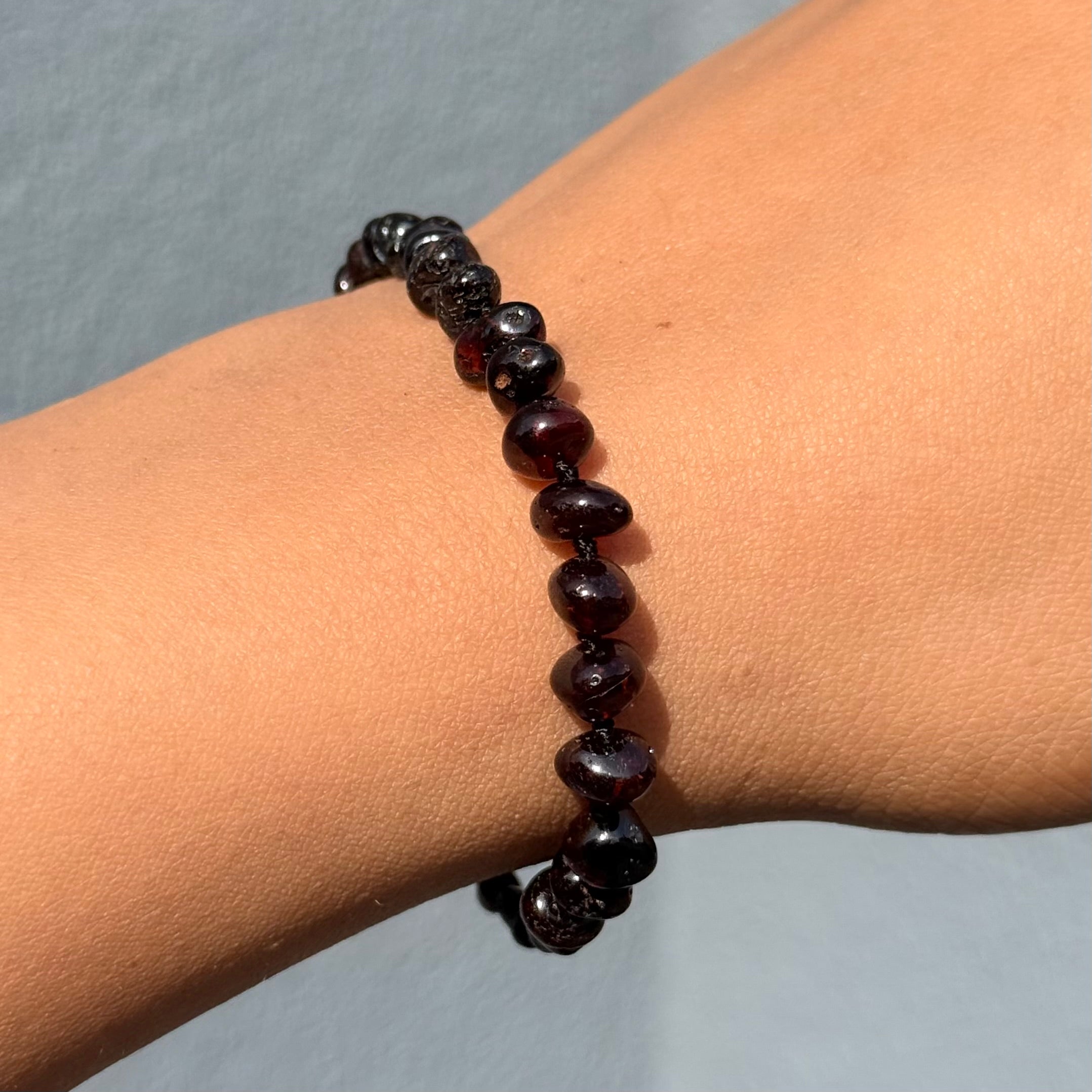 Dark Cherry and Garnet Toned Genuine Baltic Amber Baroque Stacking Bracelet with a secure screw mechanism