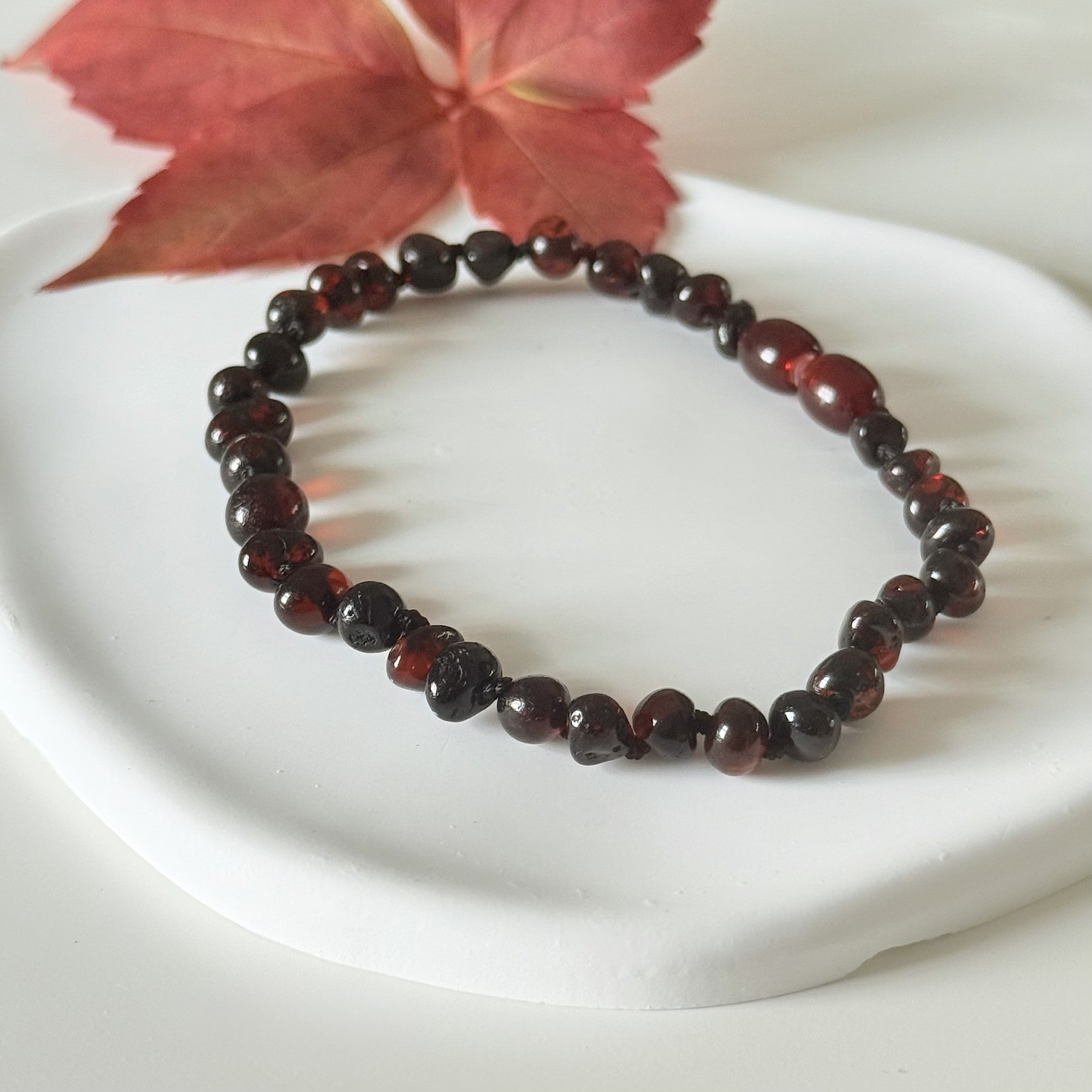 Dark Cherry and Garnet Toned Genuine Baltic Amber Baroque Stacking Bracelet with a secure screw mechanism