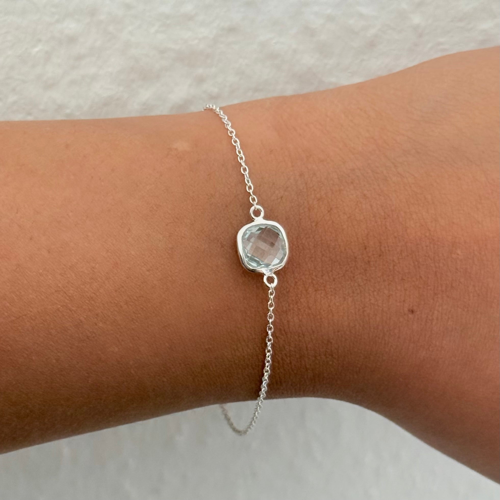 Minimal Adjustable Bracelet in Sterling Silver with a Square-Shaped Blue Topaz Gemstone