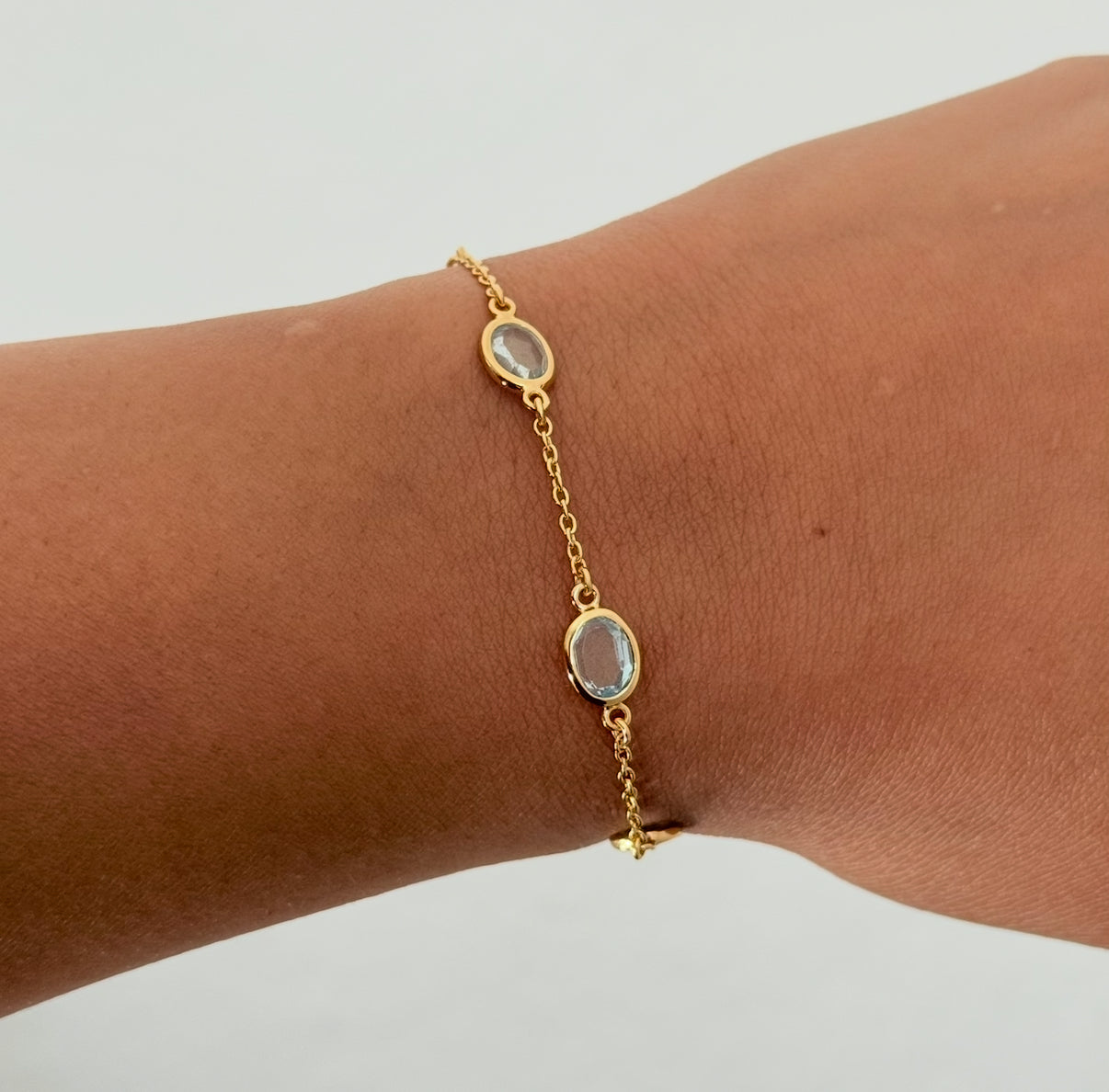 Four Oval Shaped Blue Topaz Gemstone Adjustable Bracelet in Vermeil Gold