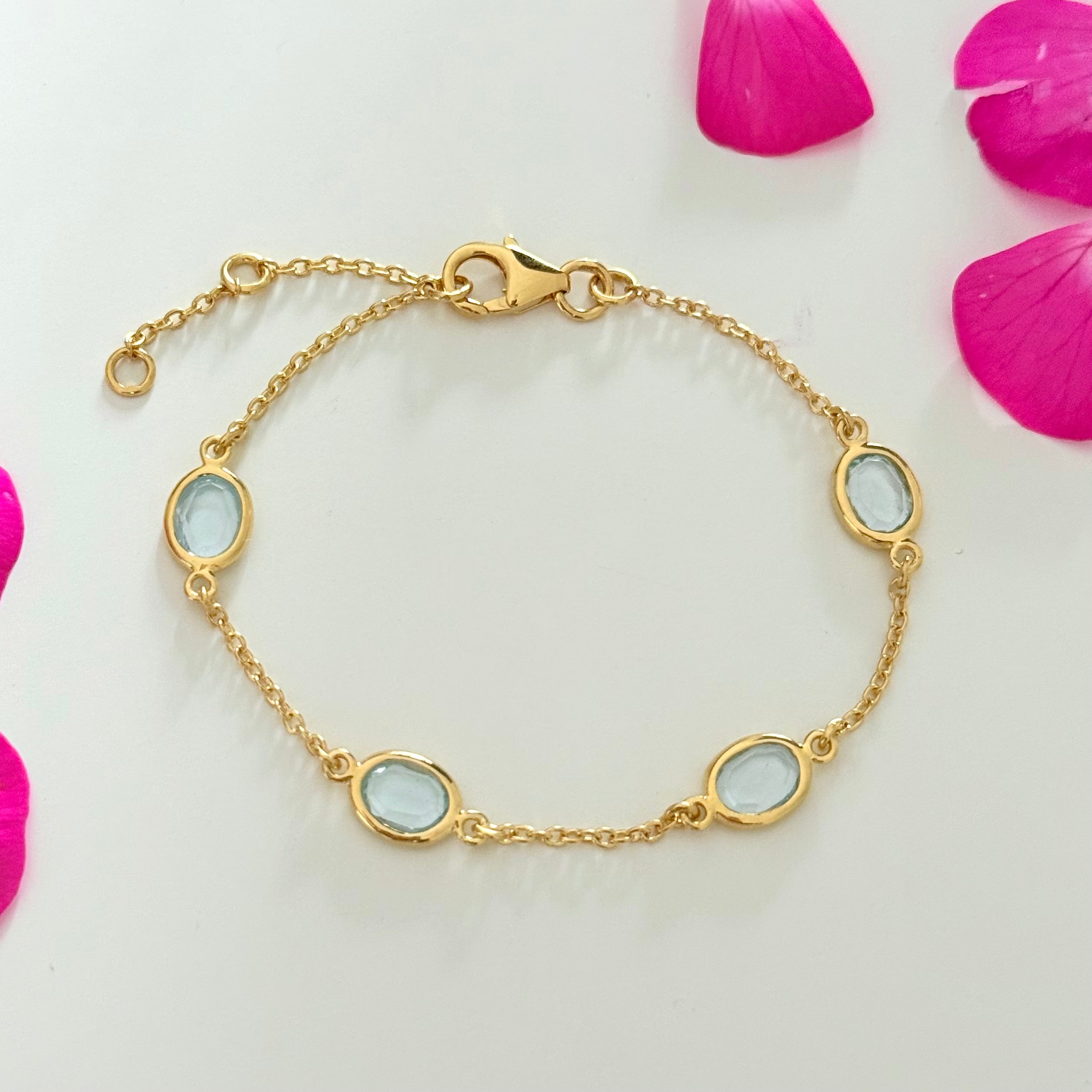 Four Oval Shaped Blue Topaz Gemstone Adjustable Bracelet in Vermeil Gold
