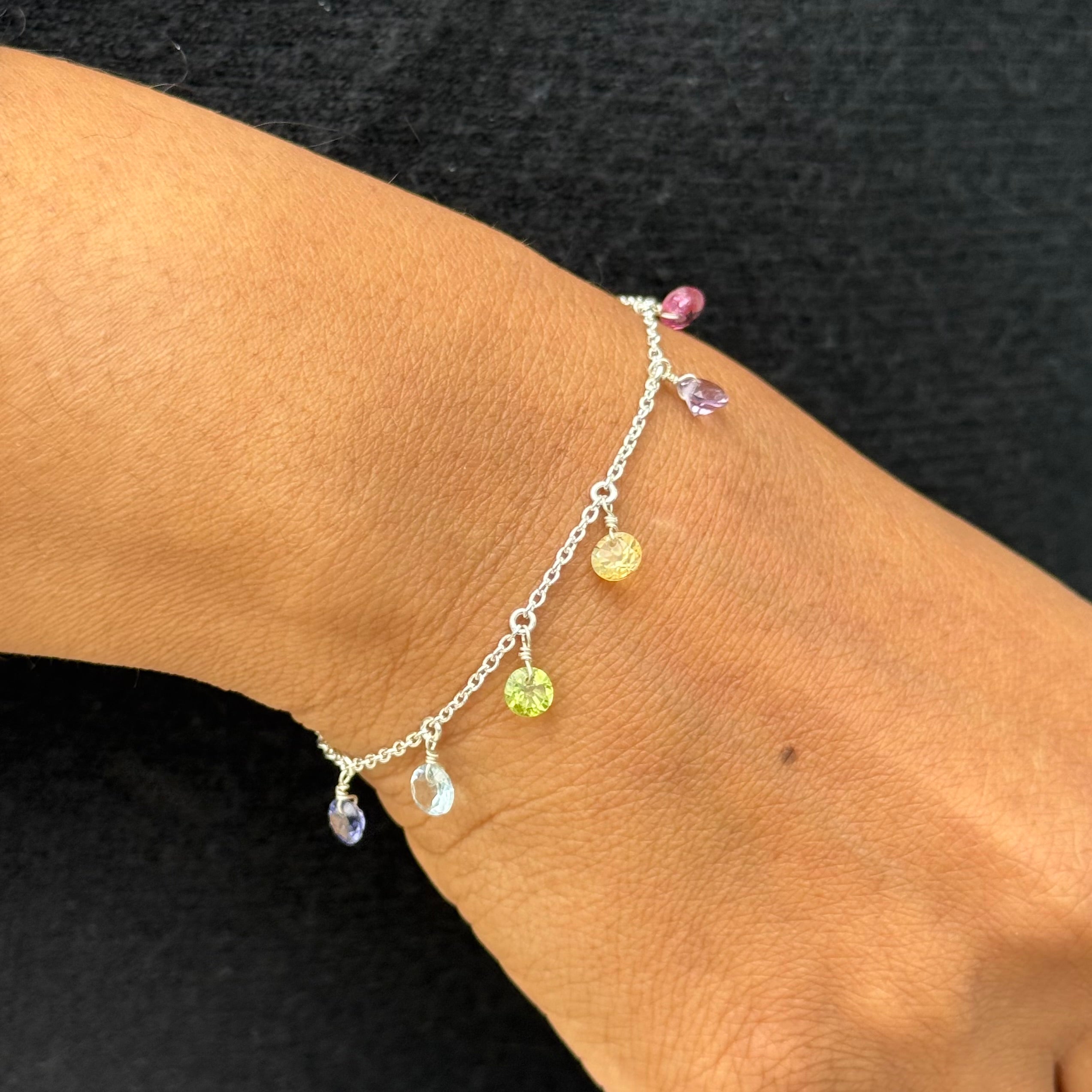Adjustable Fine Bracelet with Seven Faceted Round Diamond Cut Gemstones in Sterling Silver