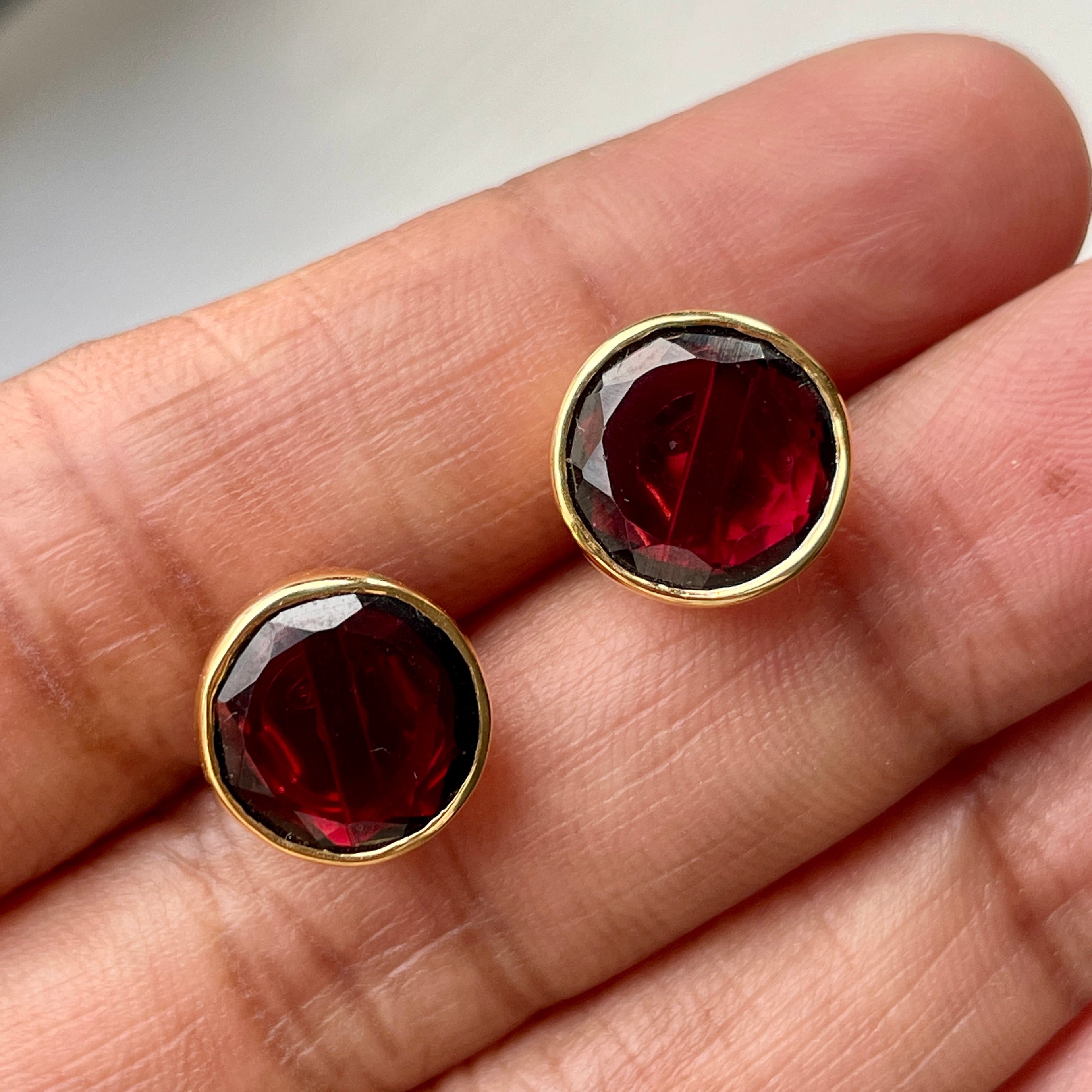 Garnet Studs in Gold Plated Sterling Silver with a Round Faceted Gemstone - Milina London
