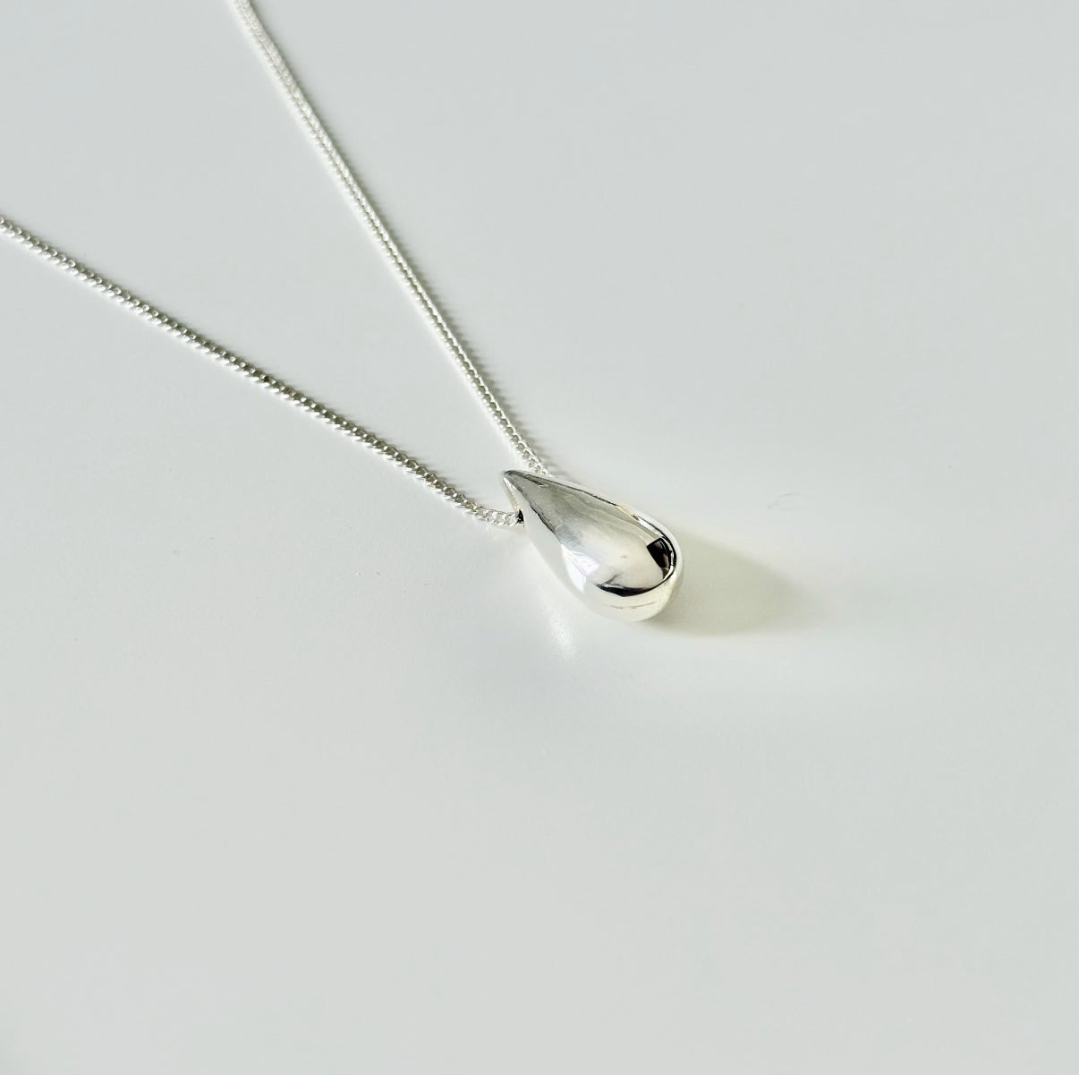 Fine Silver Necklace with Teardrop-Shaped Pendant