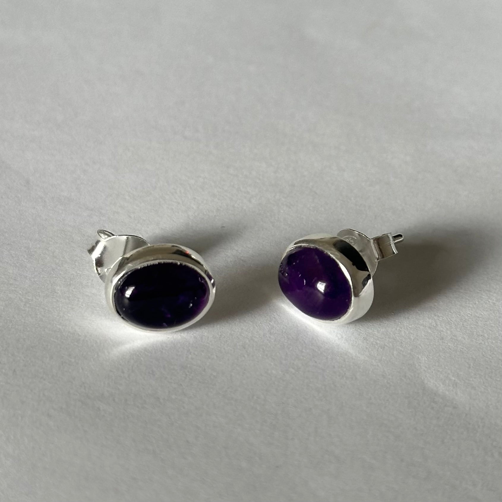 Sterling Silver Oval Stud Earrings with Cabochon Cut Amethyst Gemstone - Milina London