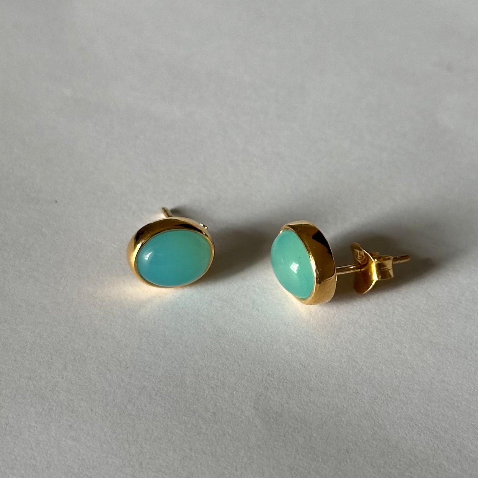 Gold Plated Sterling Silver Oval Stud Earrings with Cabochon Cut Aqua Chalcedony Gemstone - Milina London 