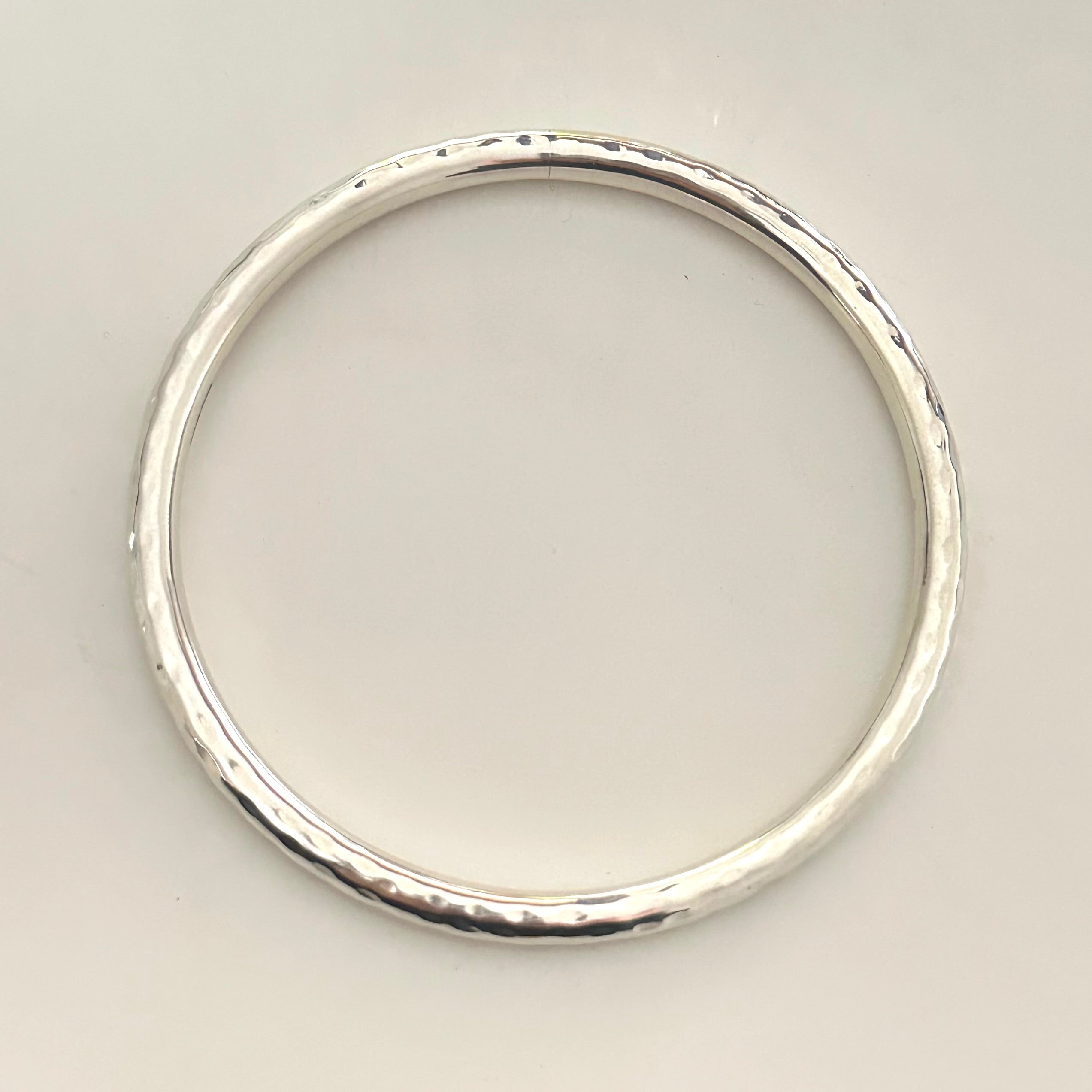 Sterling Silver Narrow Hammered Bangle - Milina London