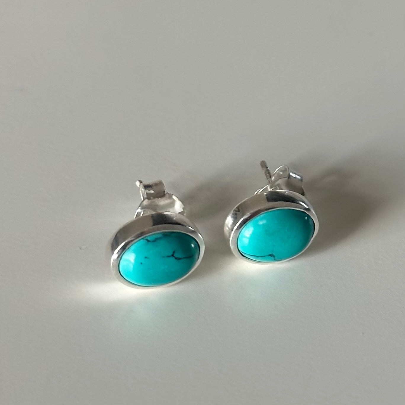 Sterling Silver Oval Stud Earrings with Cabochon Cut Turquoise Gemstone - Milina London