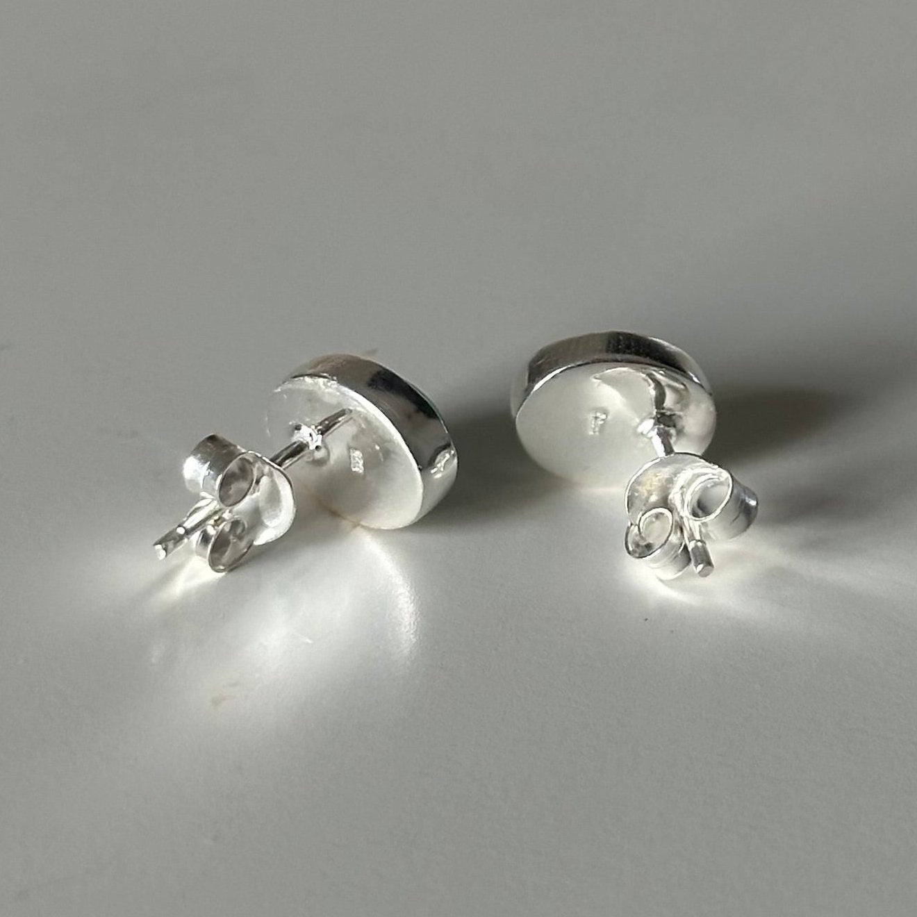 Sterling Silver Oval Stud Earrings with Cabochon Cut Garnet Gemstone - Milina London 