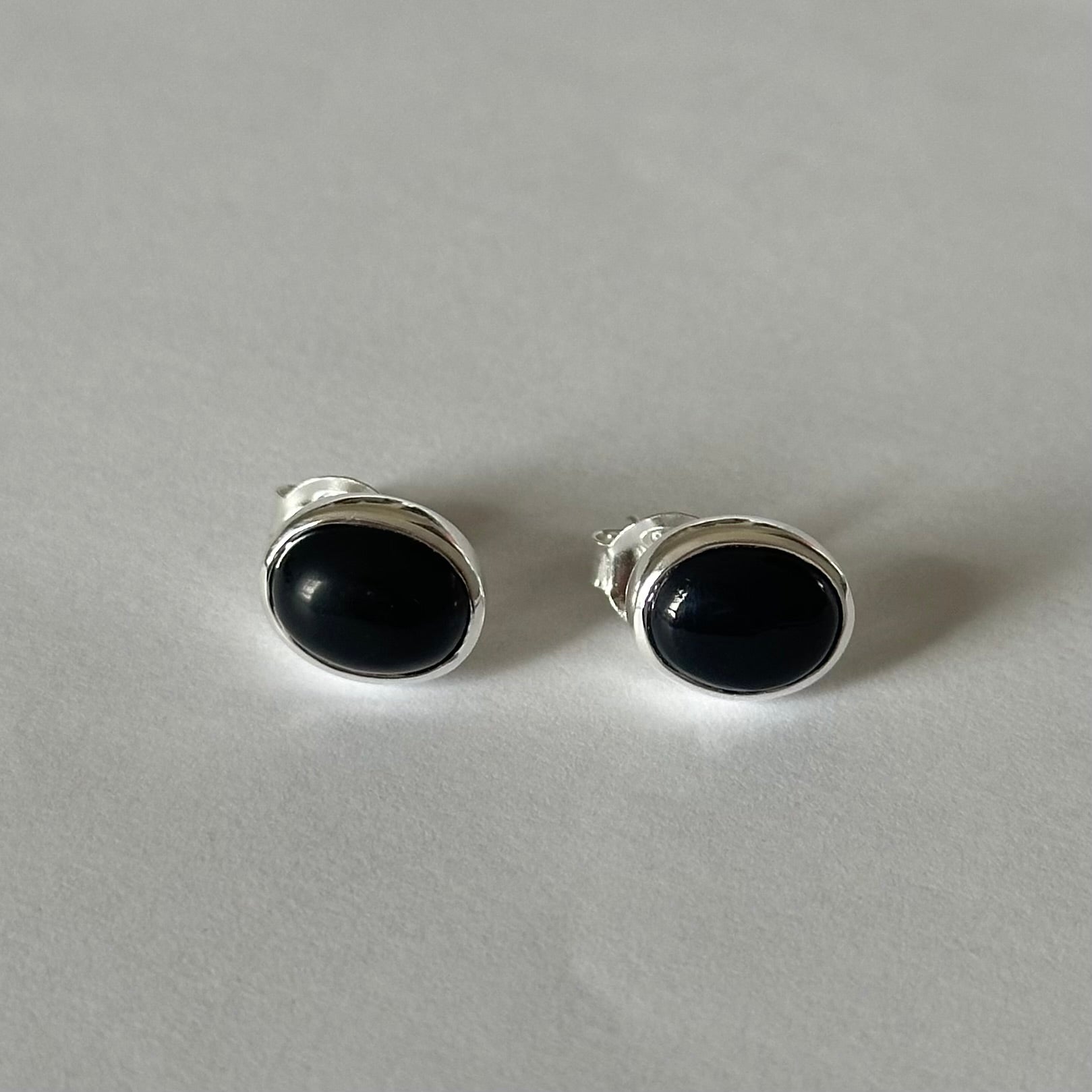 Sterling Silver Oval Stud Earrings with Cabochon Cut Black Onyx Gemstone