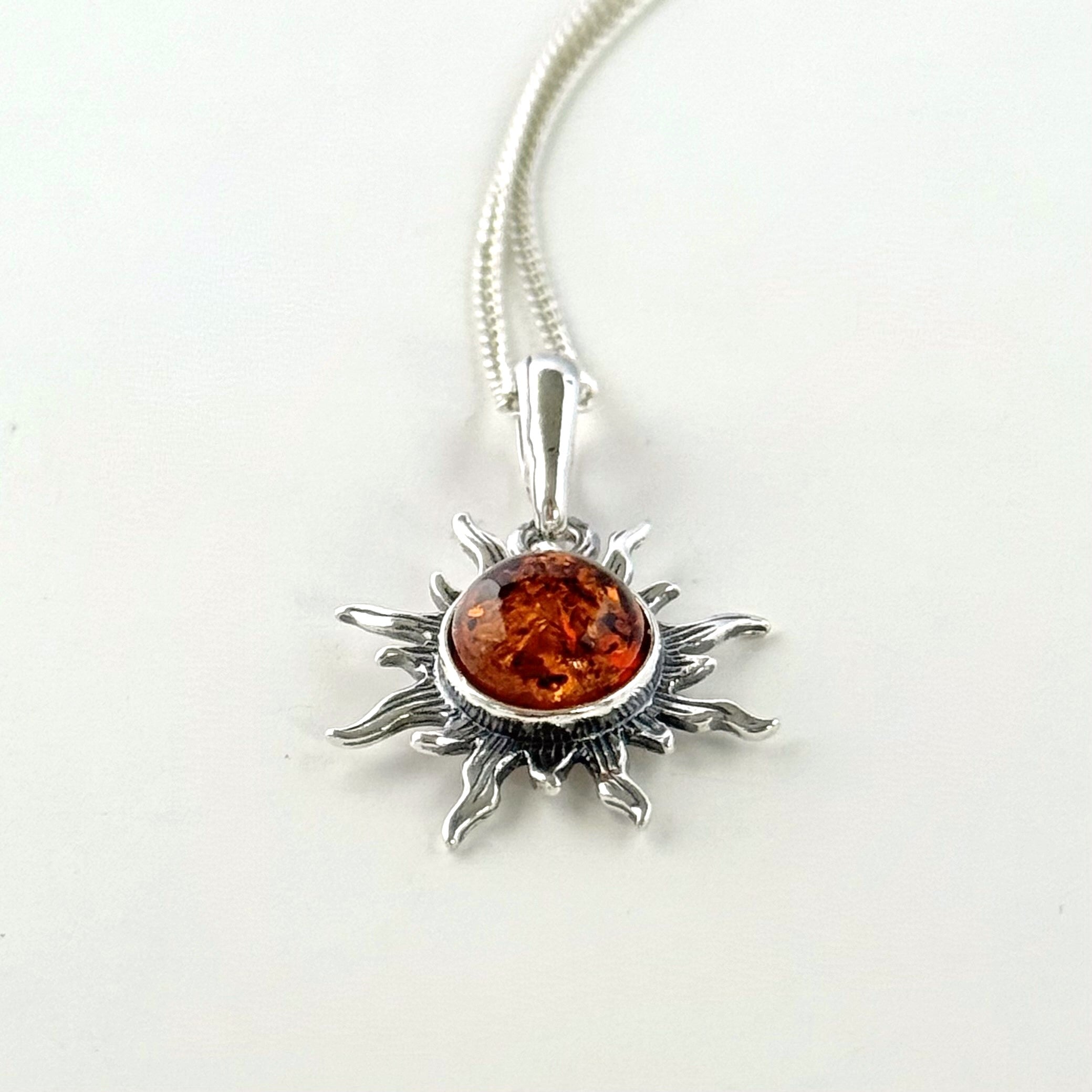 Natural Baltic Amber Sun Design Pendant Necklace in Oxidised Sterling Silver