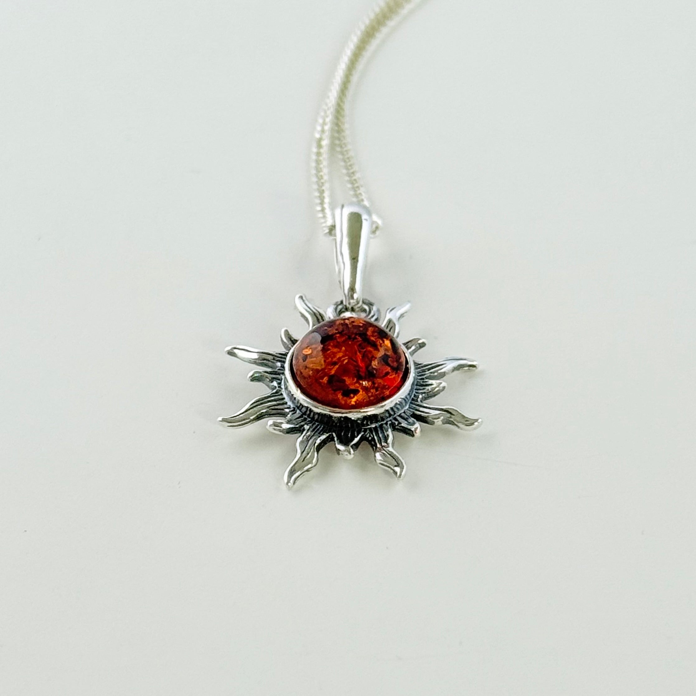 Natural Baltic Amber Sun Design Pendant Necklace in Oxidised Sterling Silver
