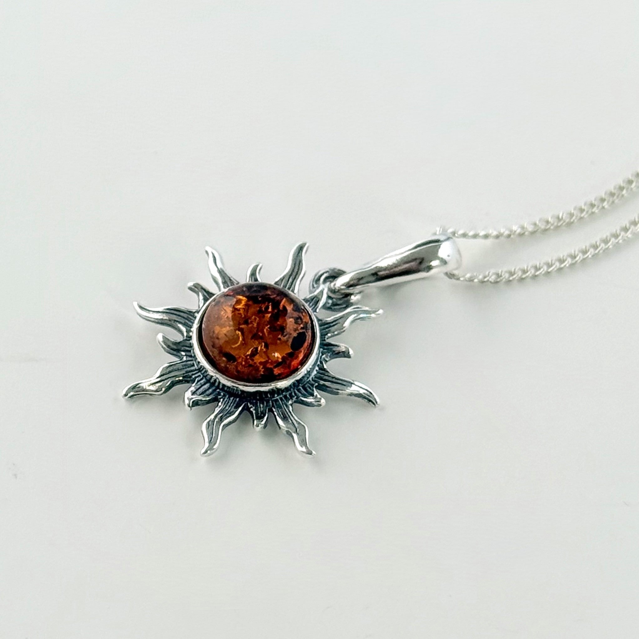 Natural Baltic Amber Sun Design Pendant Necklace in Oxidised Sterling Silver