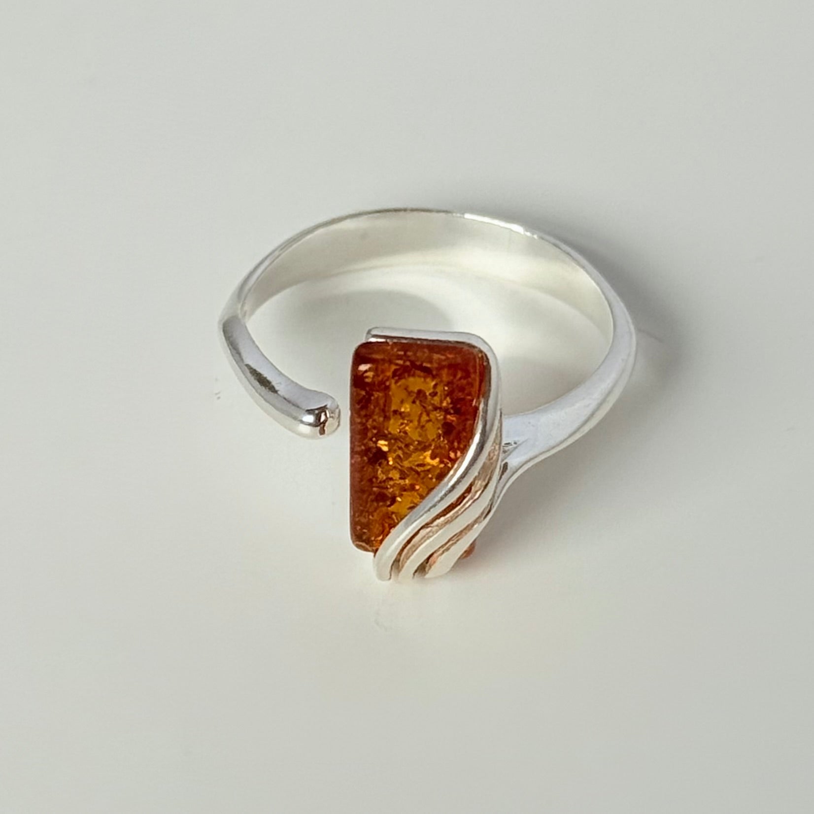 Adjustable 925 Sterling Silver Ring with Genuine Baltic Amber in a rectangular shape