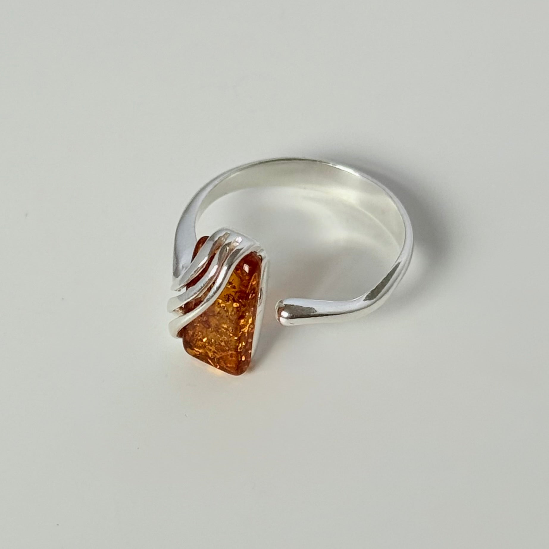 Adjustable 925 Sterling Silver Ring with Genuine Baltic Amber in a rectangular shape