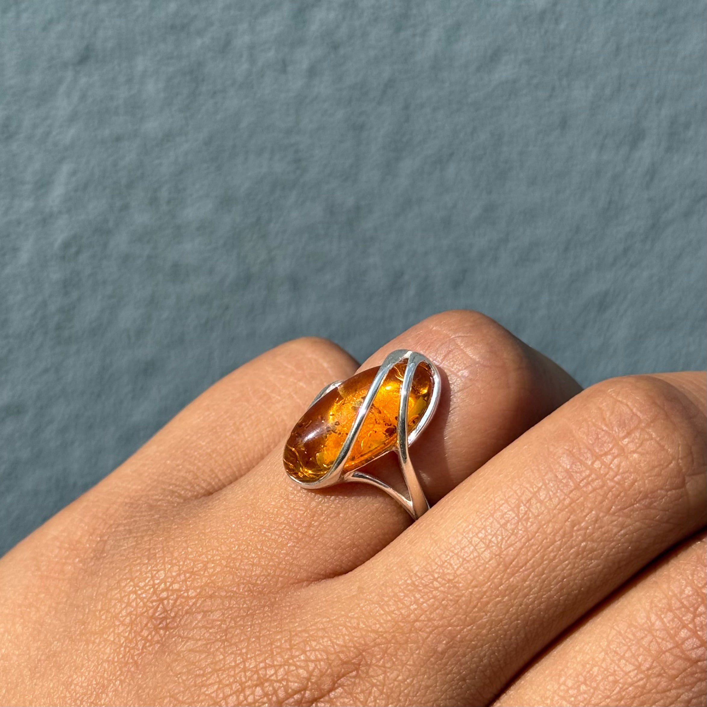 Adjustable Genuine Baltic Amber Ring in Sterling Silver with an Oval Shaped Stone
