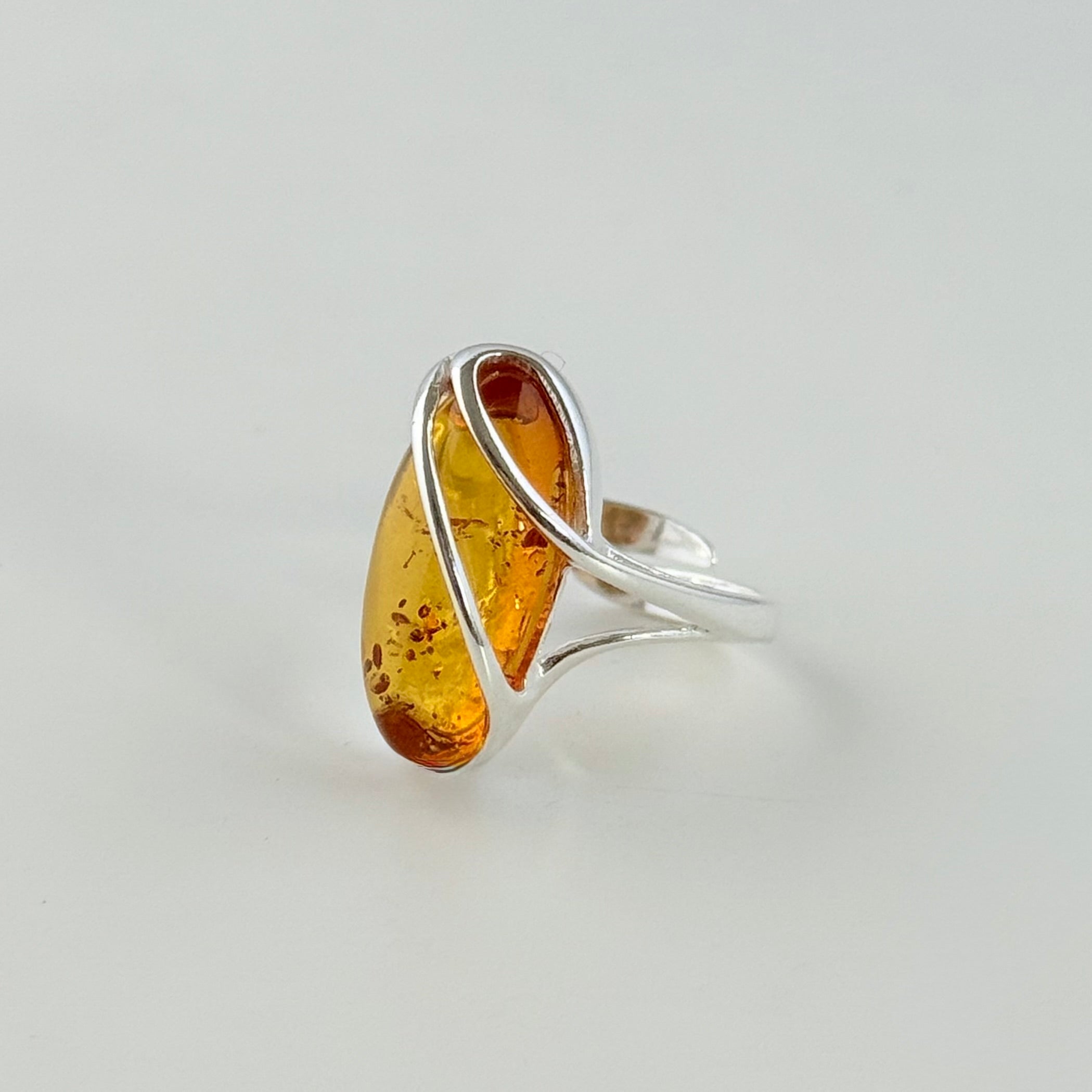 Adjustable Genuine Baltic Amber Ring in Sterling Silver with an Oval Shaped Stone