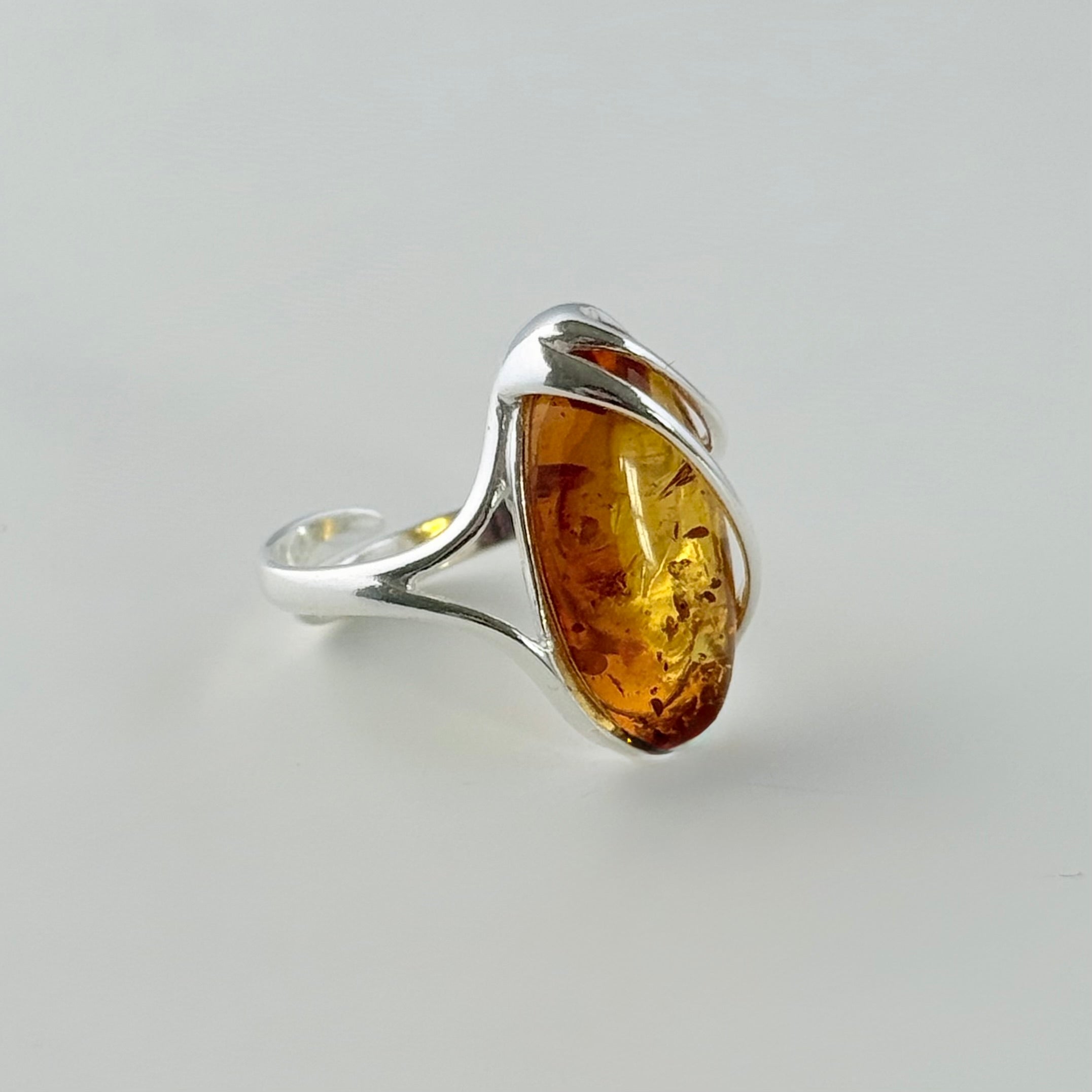 Adjustable Genuine Baltic Amber Ring in Sterling Silver with an Oval Shaped Stone