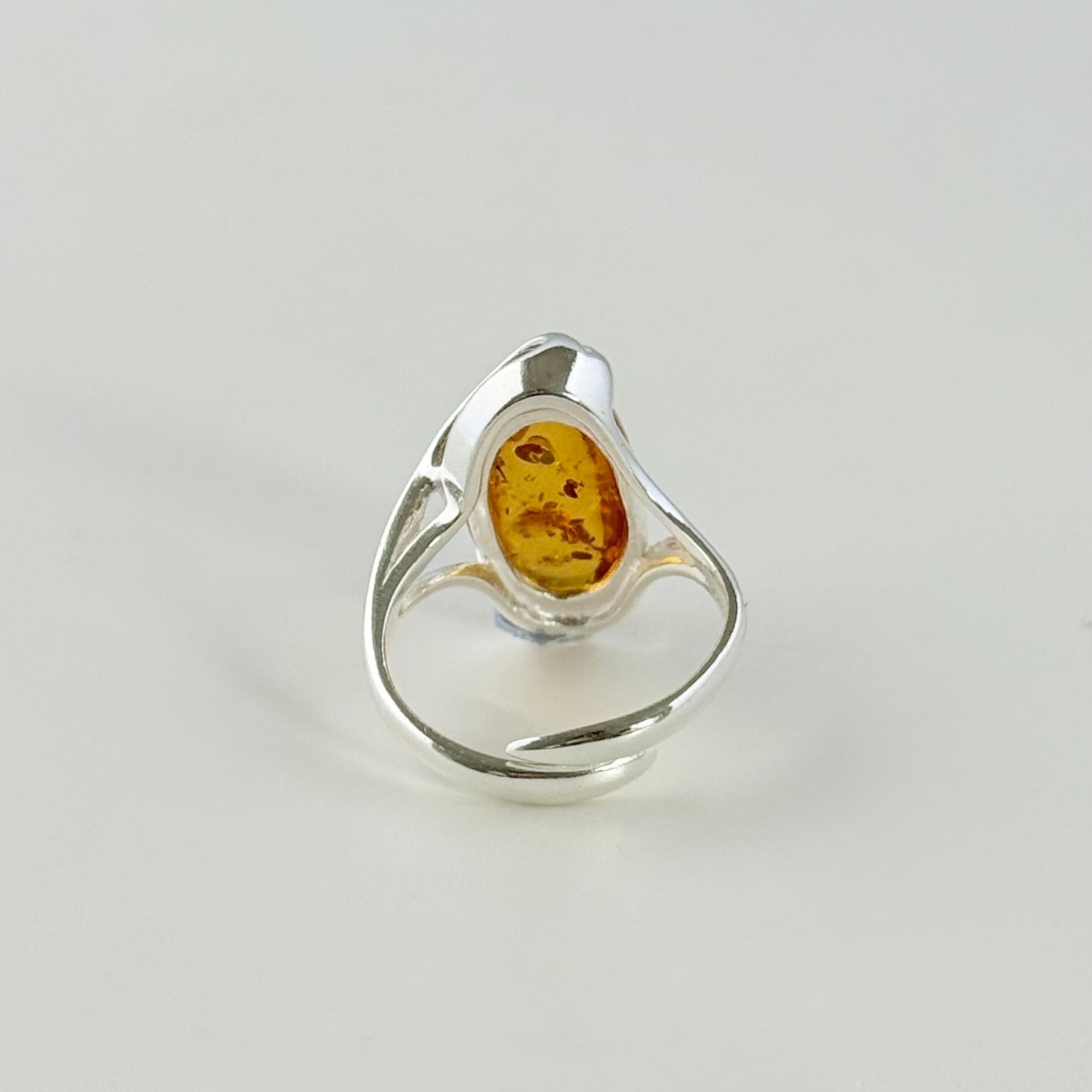 Adjustable Genuine Baltic Amber Ring in Sterling Silver with an Oval Shaped Stone
