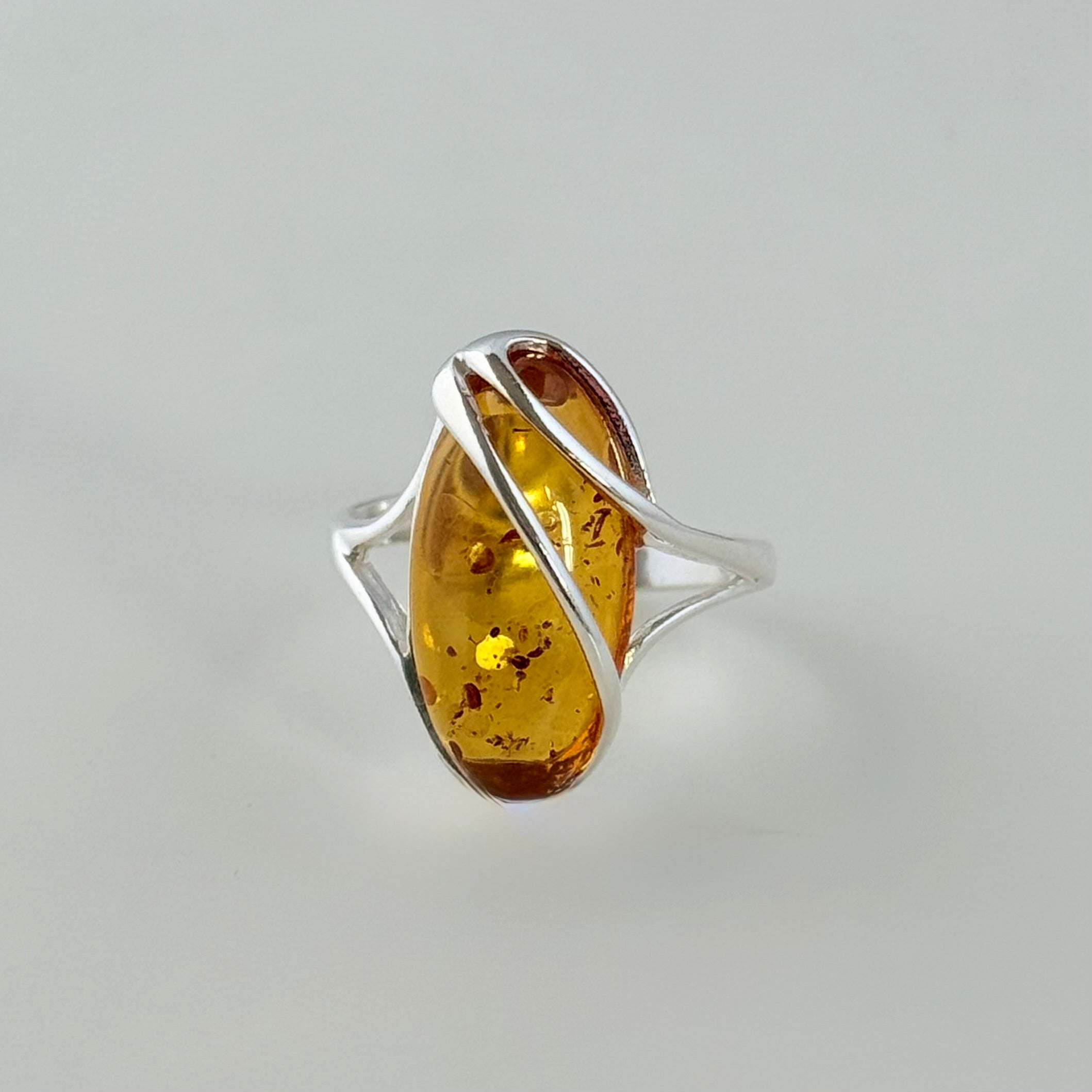 Adjustable Genuine Baltic Amber Ring in Sterling Silver with an Oval Shaped Stone