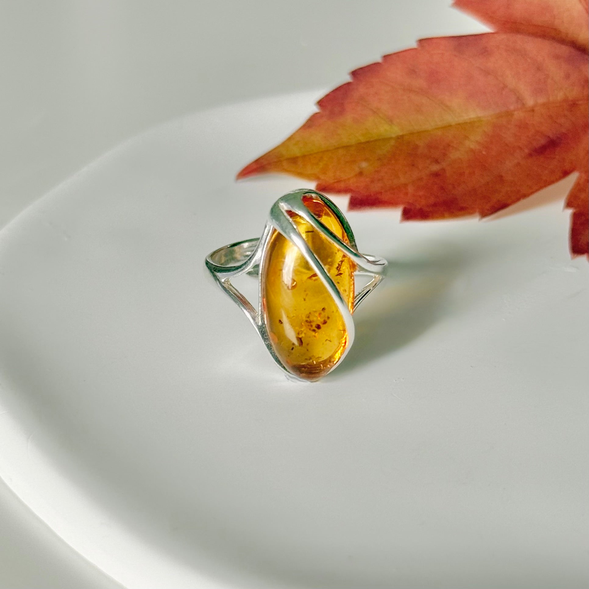 Adjustable Genuine Baltic Amber Ring in Sterling Silver with an Oval Shaped Stone
