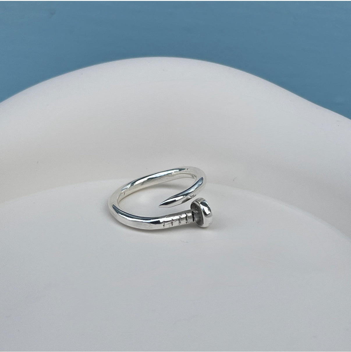 Sterling Silver Ring with a Nail Inspired Design