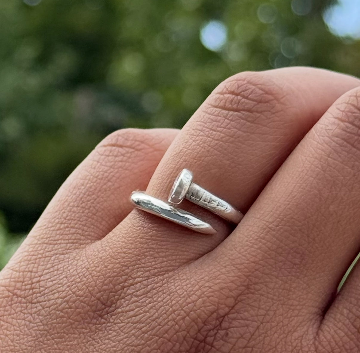 Sterling Silver Ring with a Nail Inspired Design