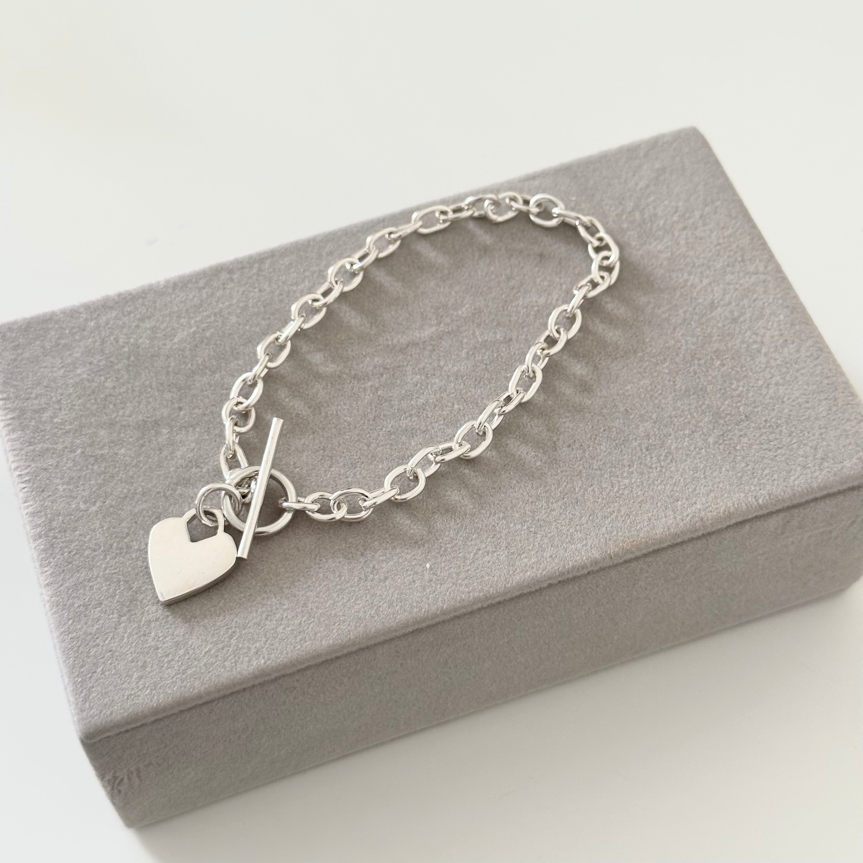 Sterling Silver Bracelet with Fine Oval Links and a Heart Charm