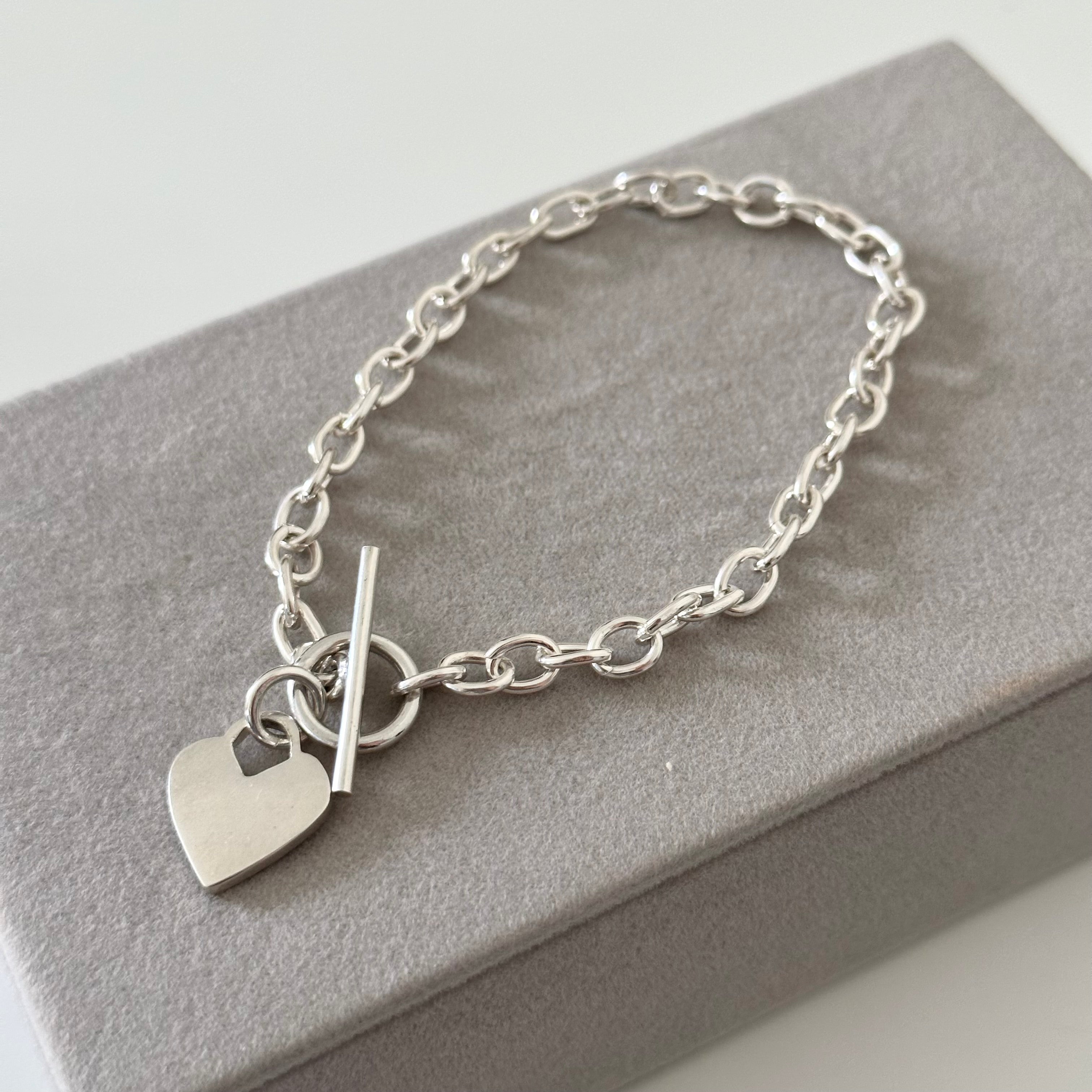 Sterling Silver Bracelet with Fine Oval Links and a Heart Charm