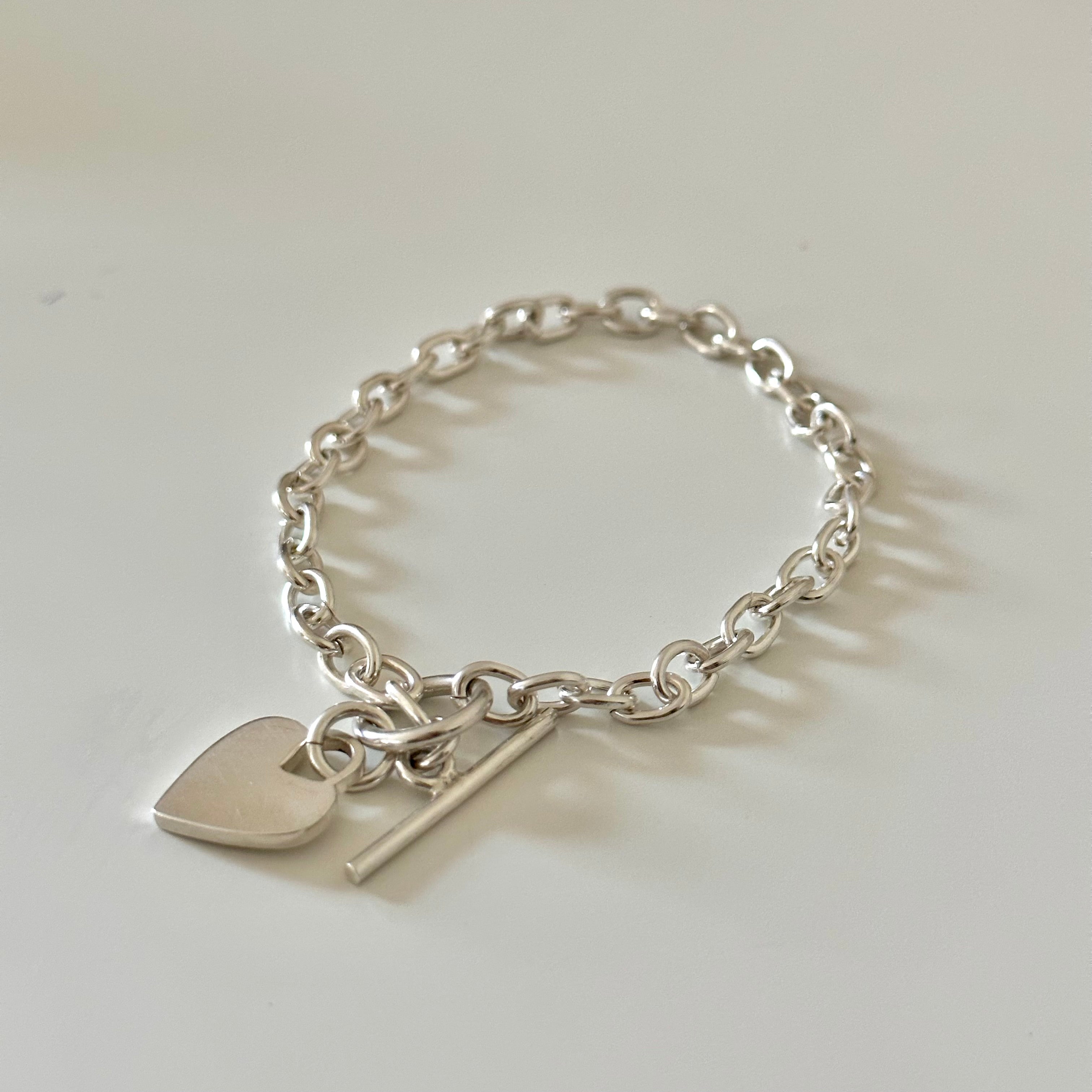 Sterling Silver Bracelet with Fine Oval Links and a Heart Charm