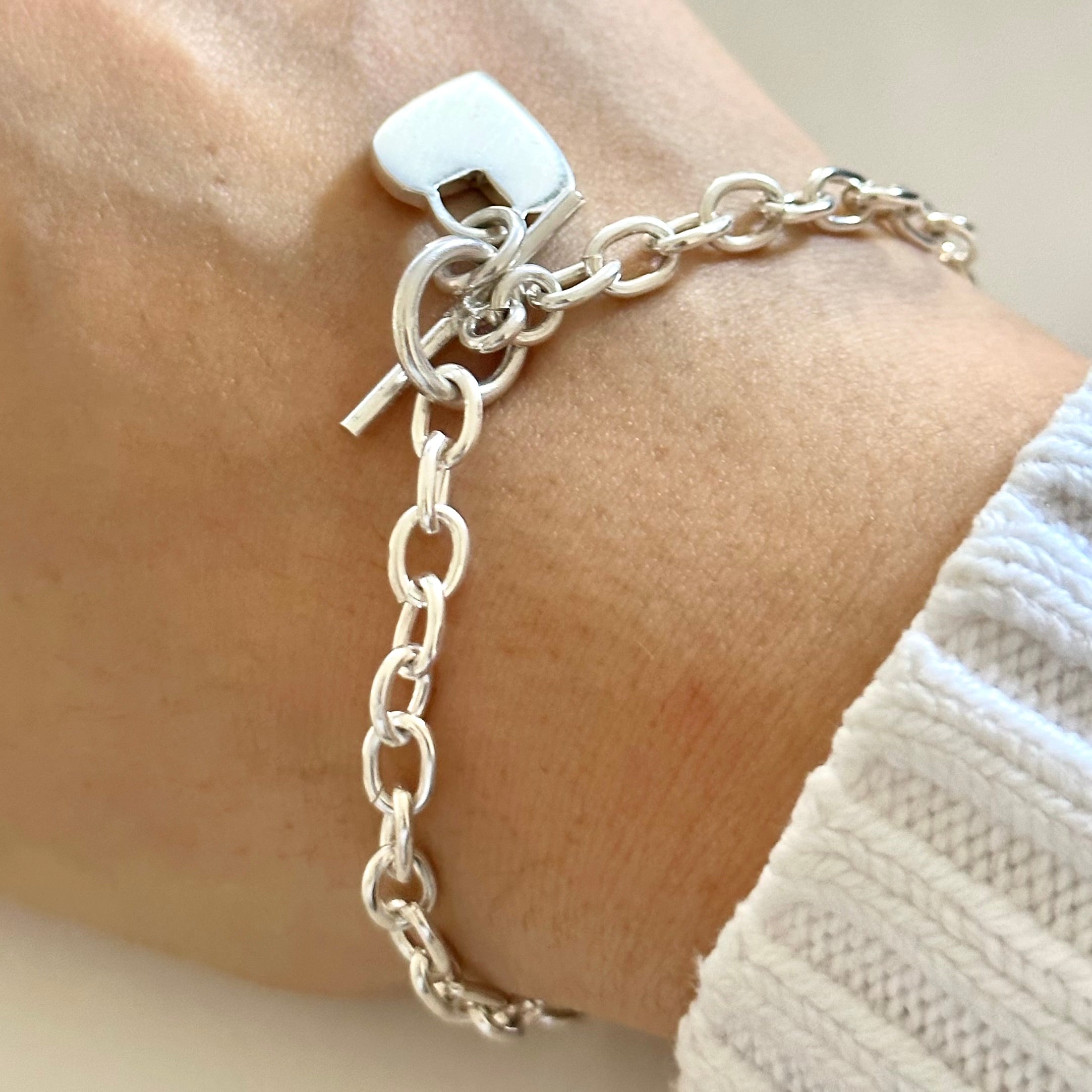 Sterling Silver Bracelet with Fine Oval Links and a Heart Charm