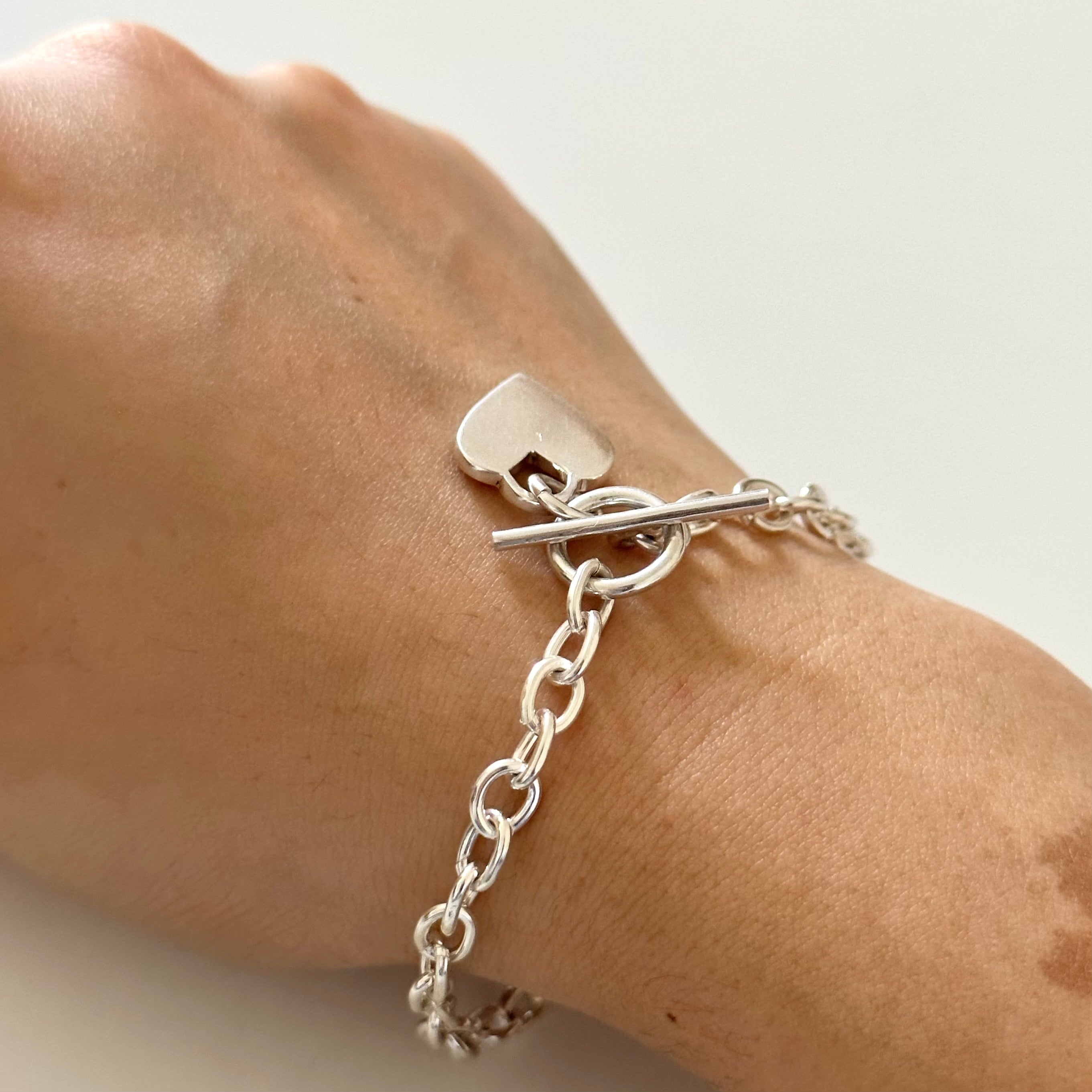 Sterling Silver Bracelet with Fine Oval Links and a Heart Charm