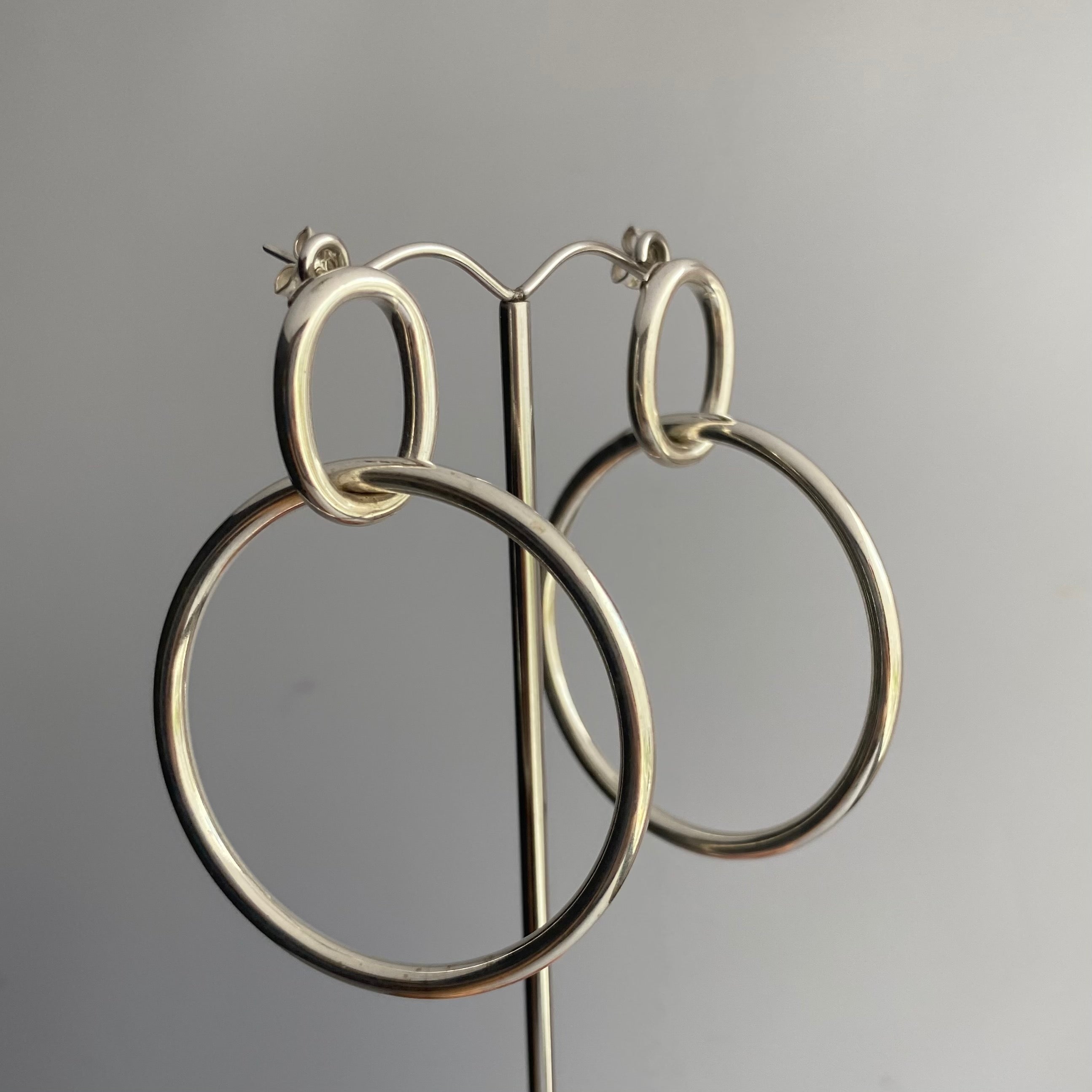 Two Interlinked Sterling Silver Hoop Earrings