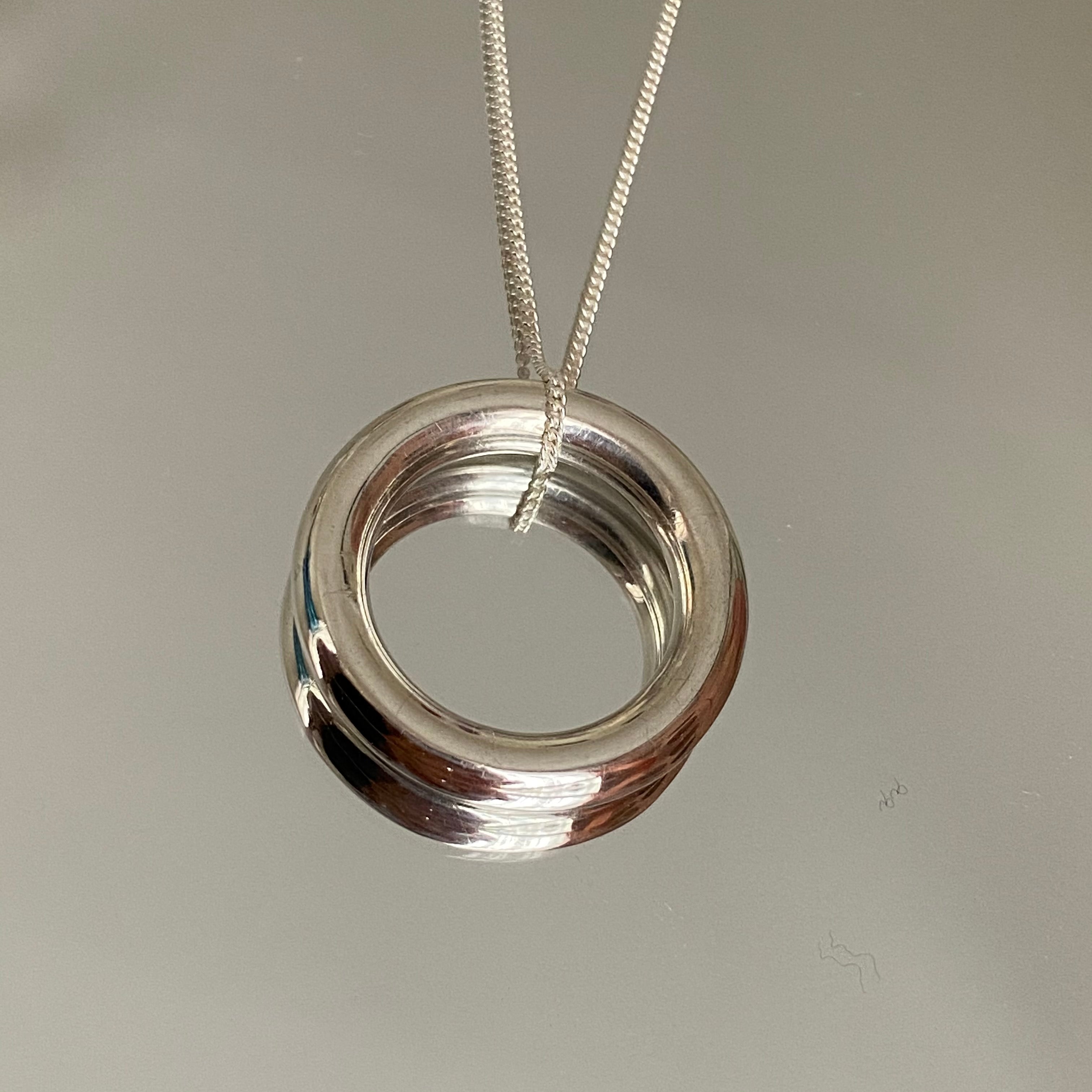 Sterling Silver Round Tube Ring Pendant On Silver Chain