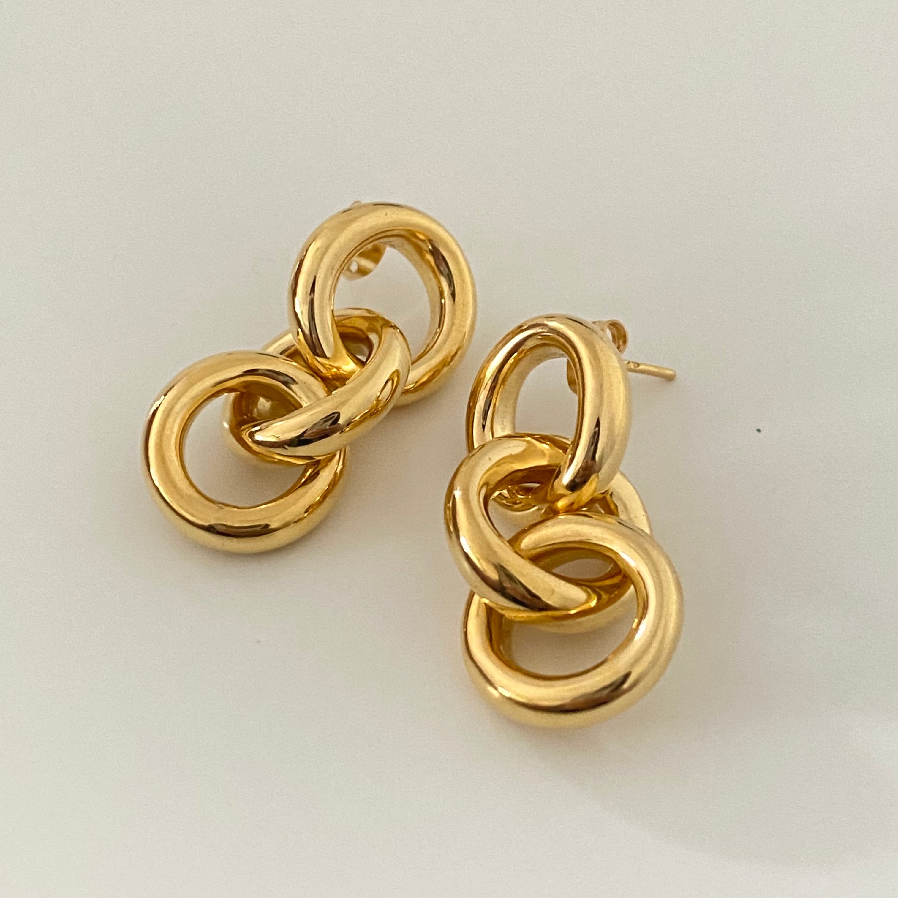 Three Small Interlinked Gold Plated Sterling Silver Circle Hoop Earrings