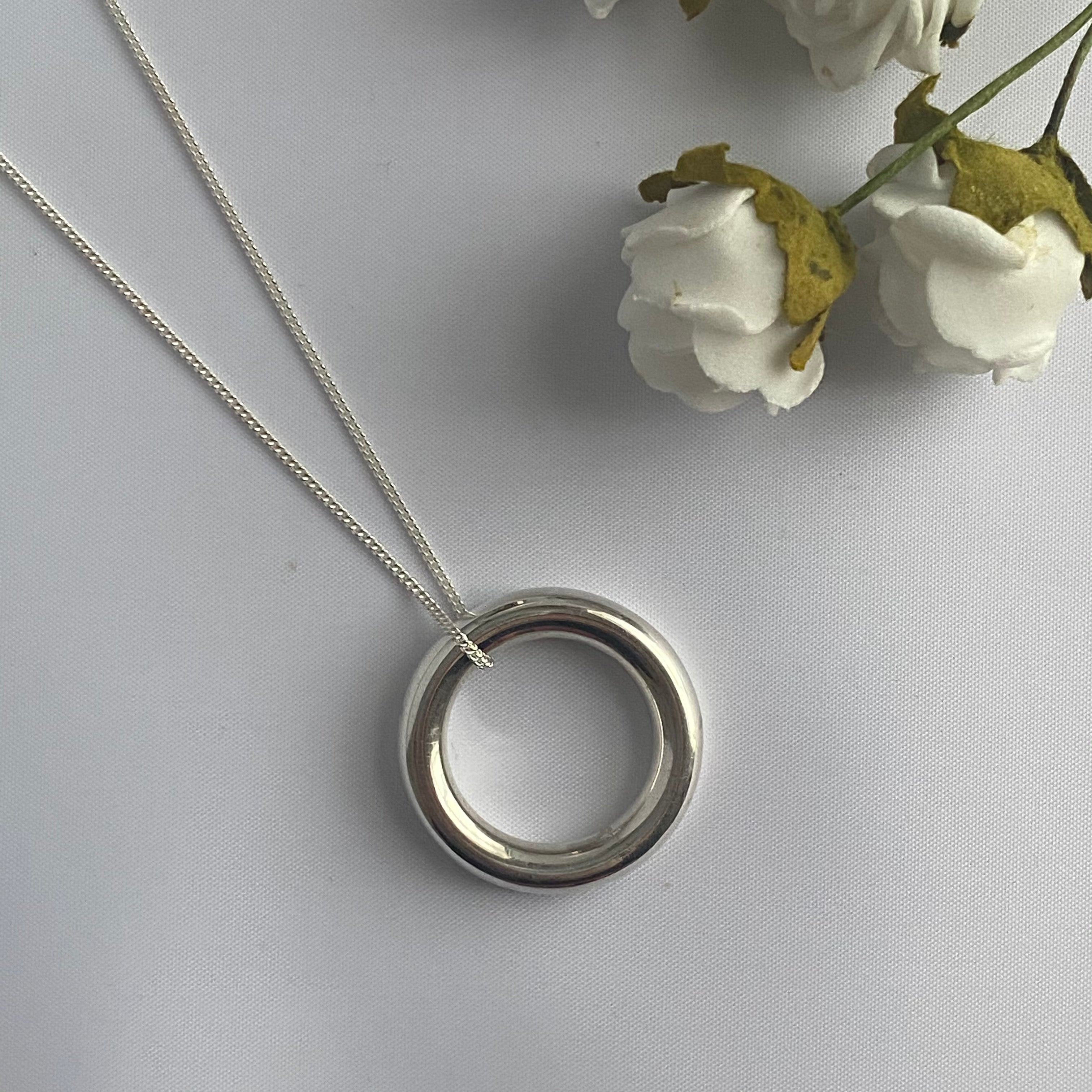 Sterling Silver Round Tube Ring Pendant On Silver Chain