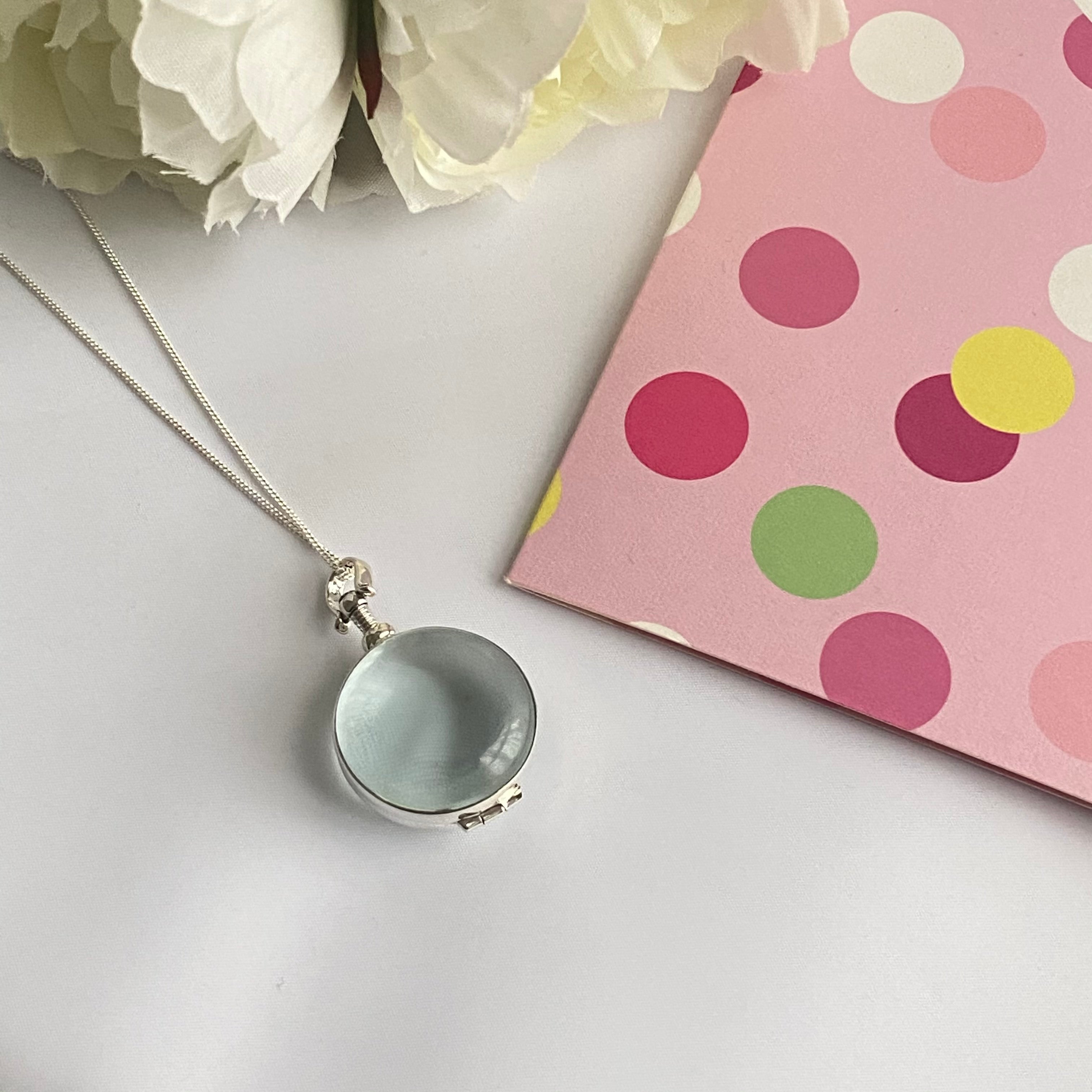 Round silver locket hotsell