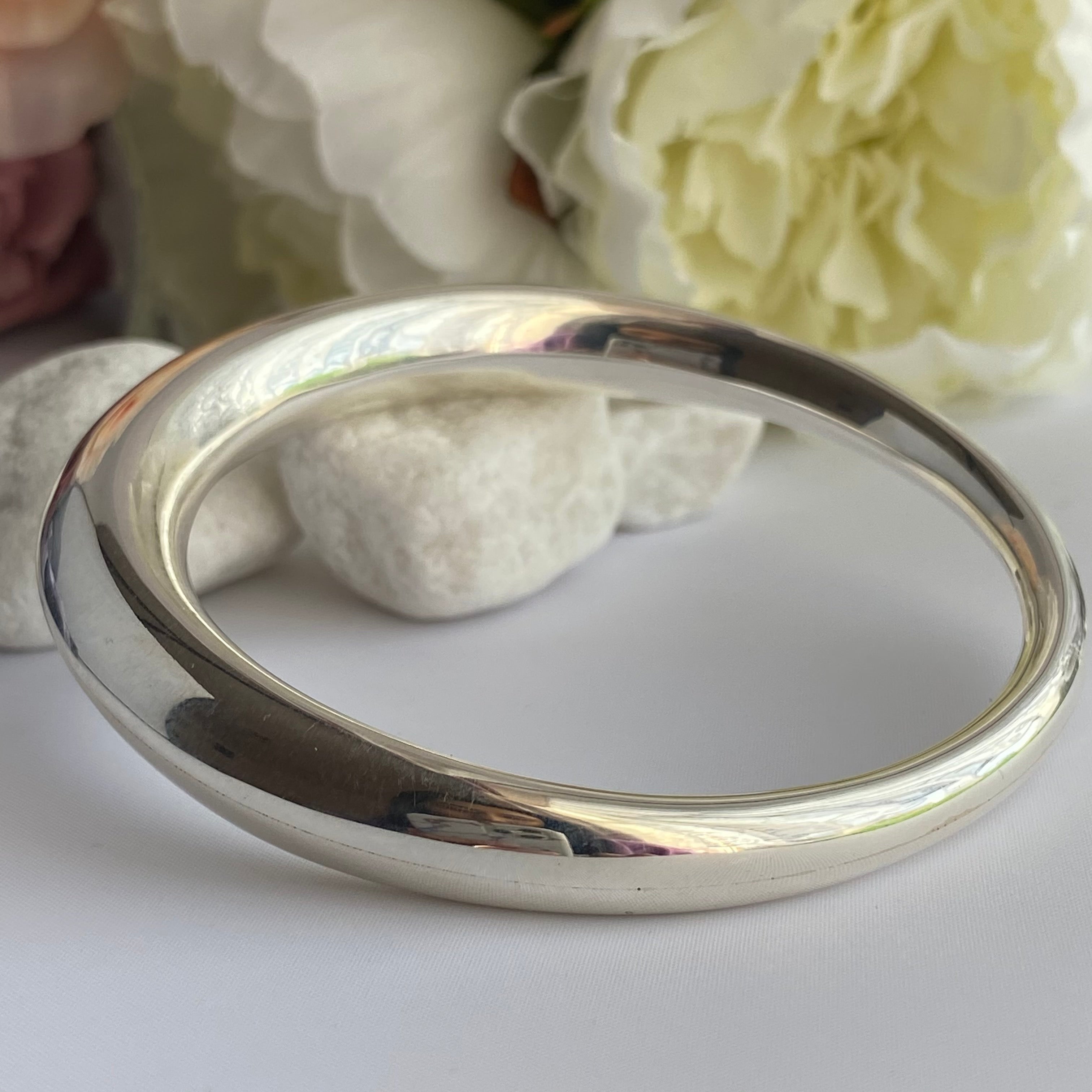 Chunky Silver Round Bangle with a Graduated Tapered Design