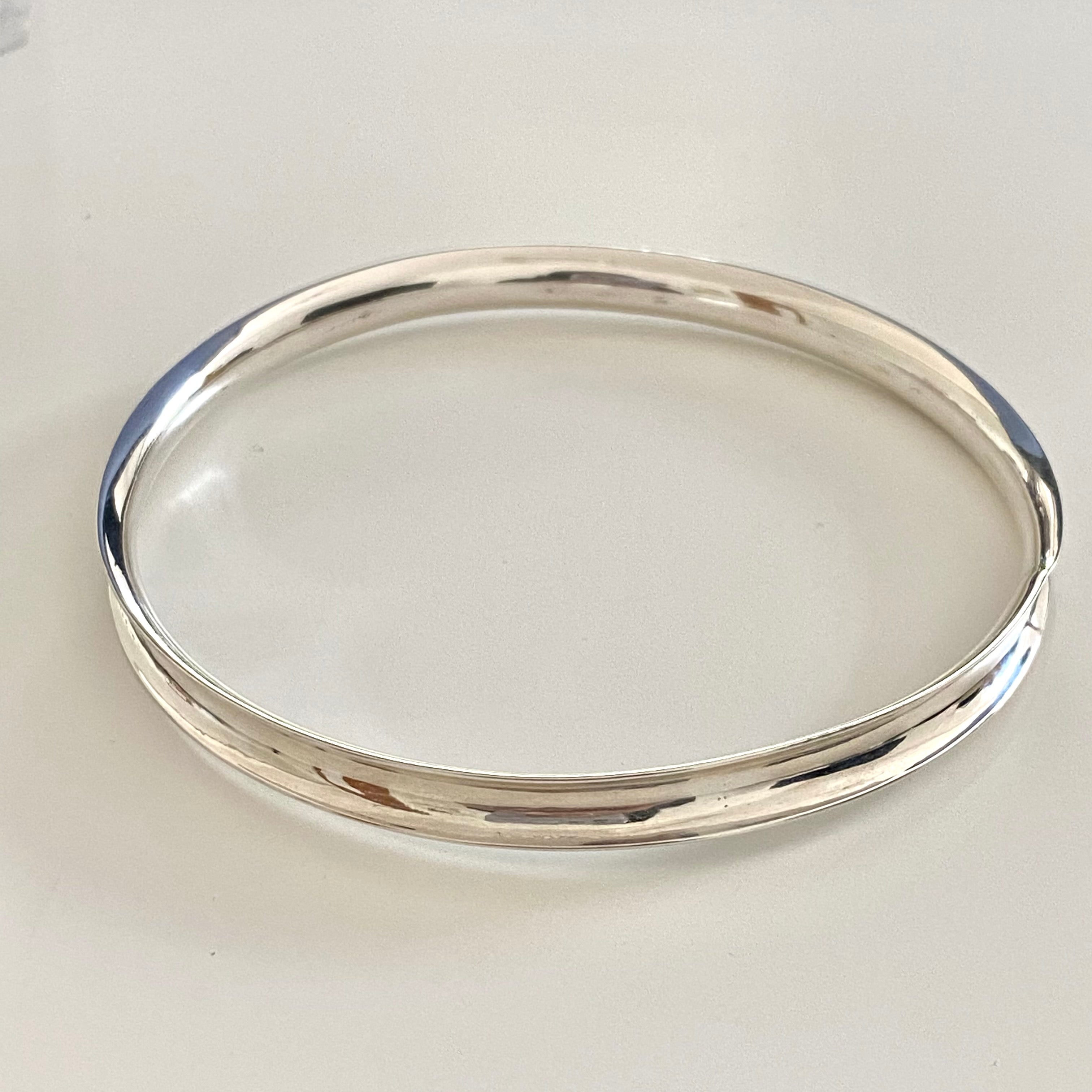 Round Sterling Silver 5mm wide Concave Bangle with a Polished Shiny Finish