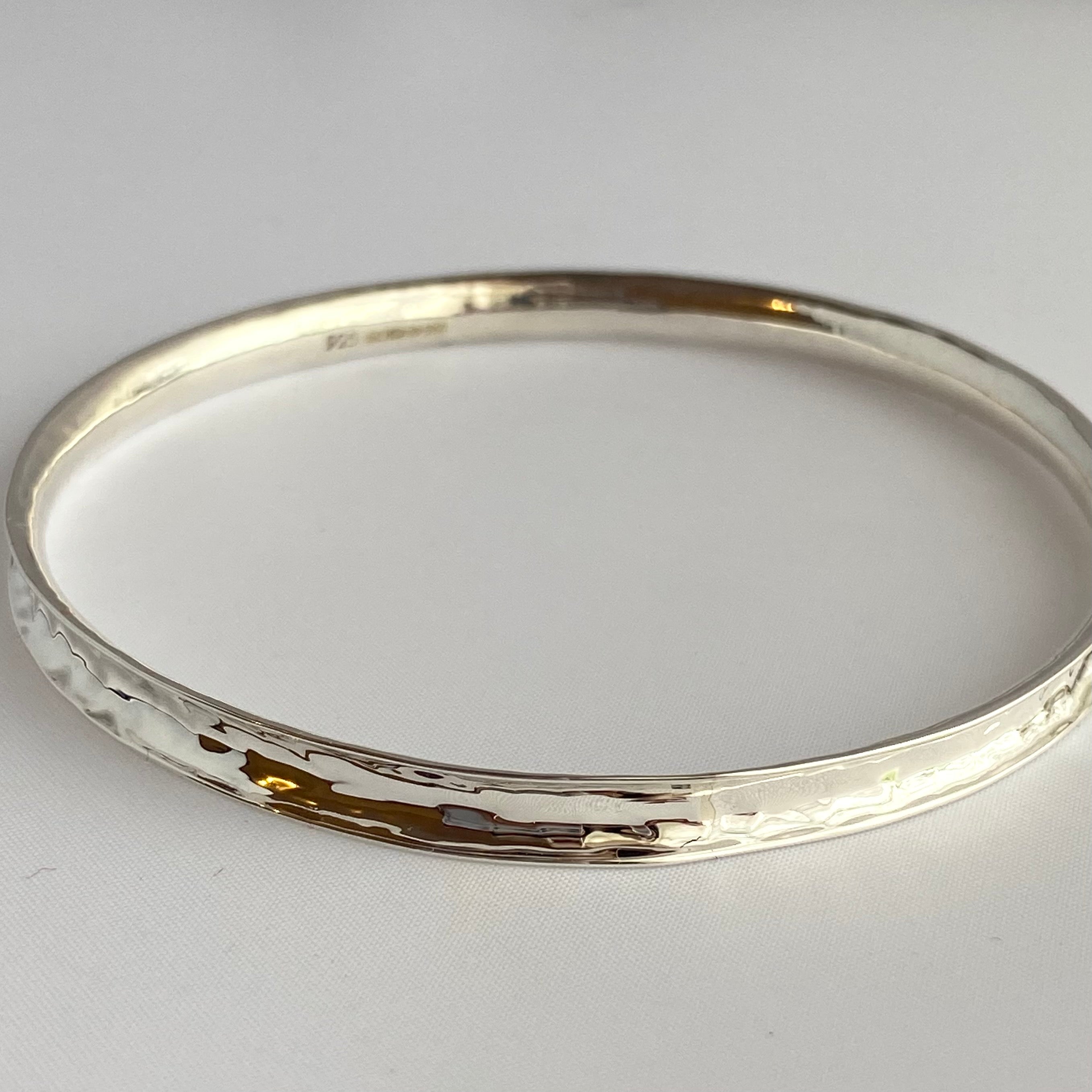 Round Sterling Silver 5mm wide Concave Bangle with a Hammered Finish