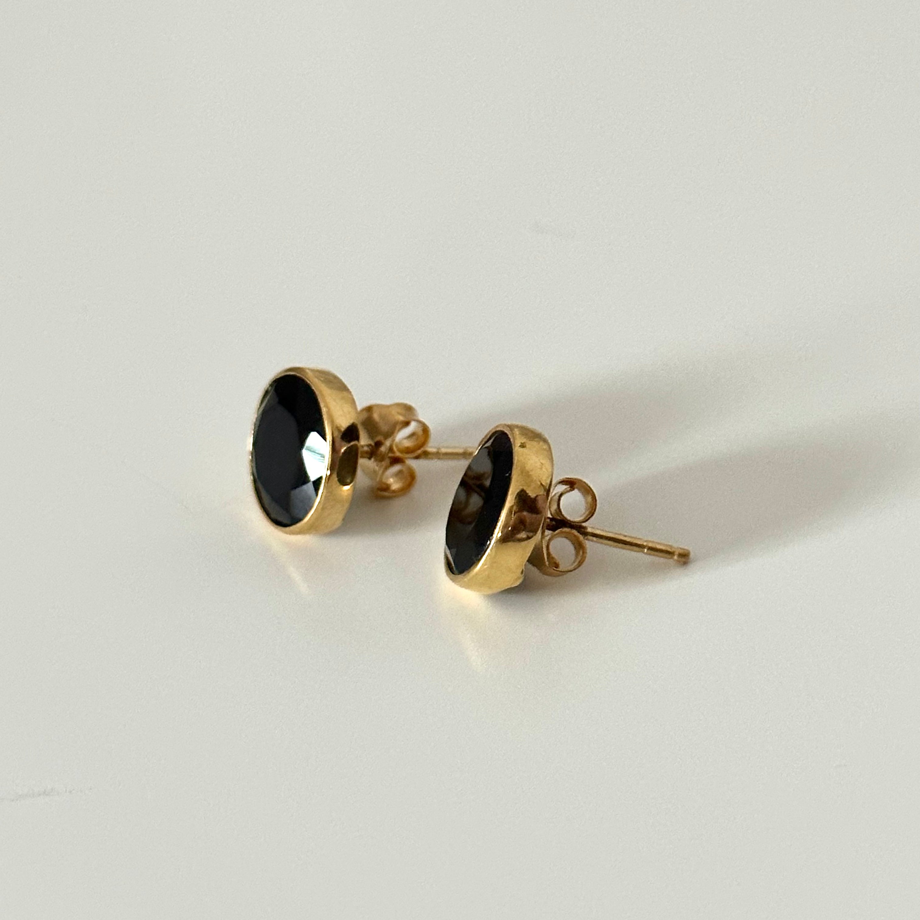 Black Onyx Studs in Gold Plated Sterling Silver with a Round Faceted Gemstone