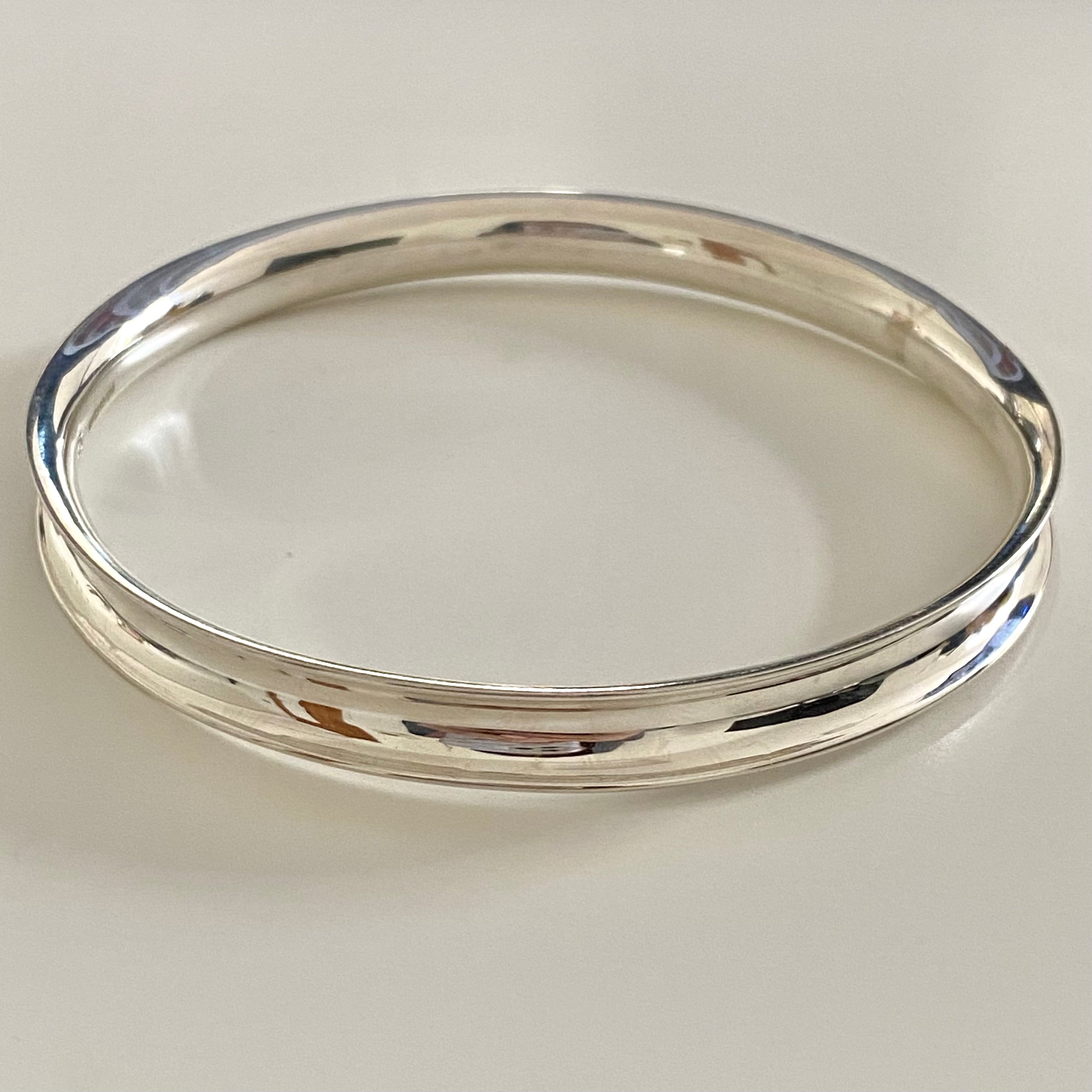 Chunky Sterling Silver 7mm wide Concave Bangle with a Polished Shiny Finish