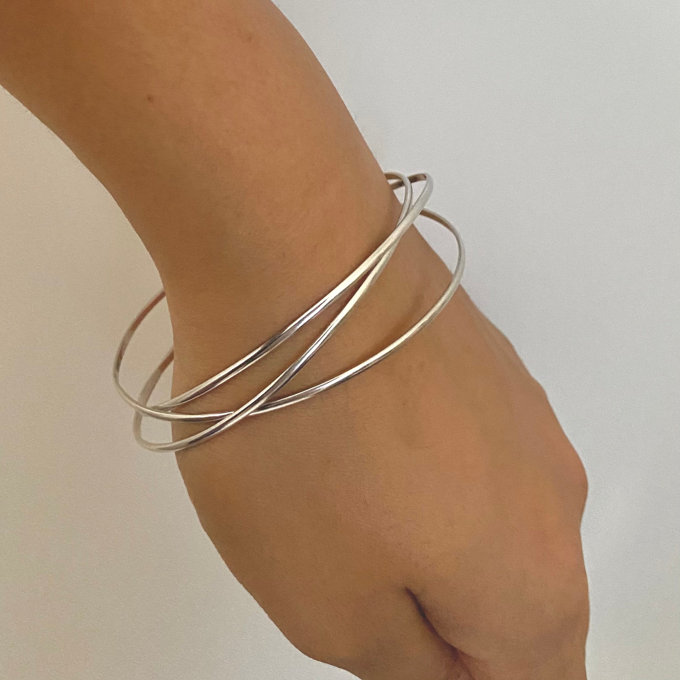 Intertwined Silver Bangle