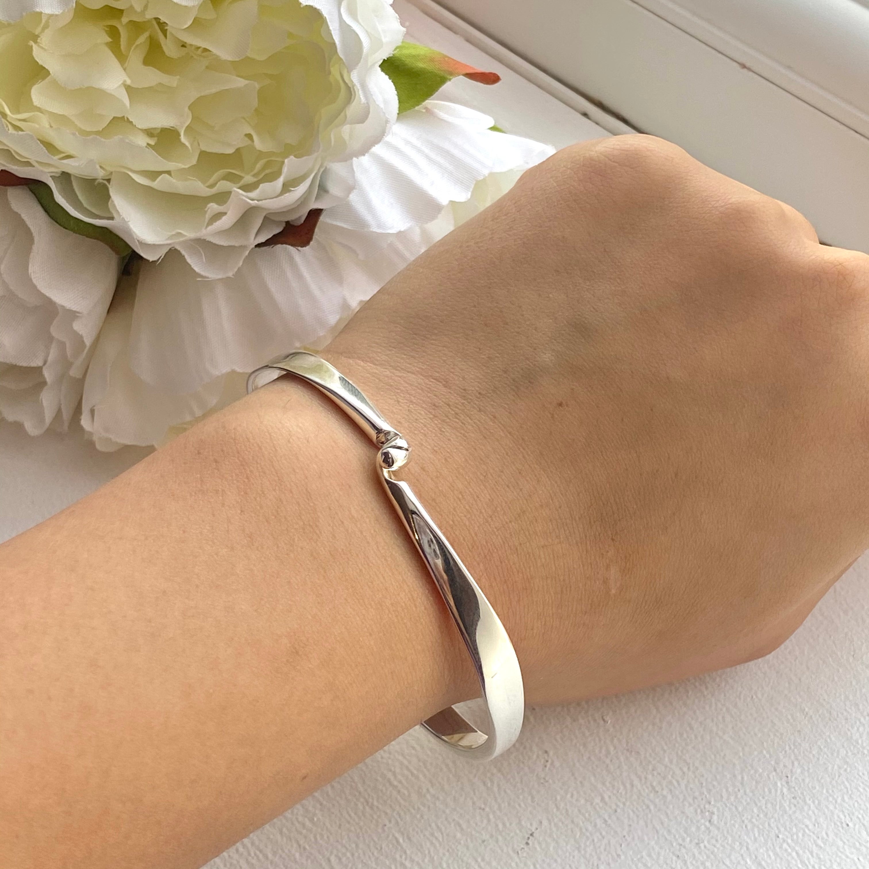 Sterling Silver Clasp Bangle with a Tapered Design Milina London