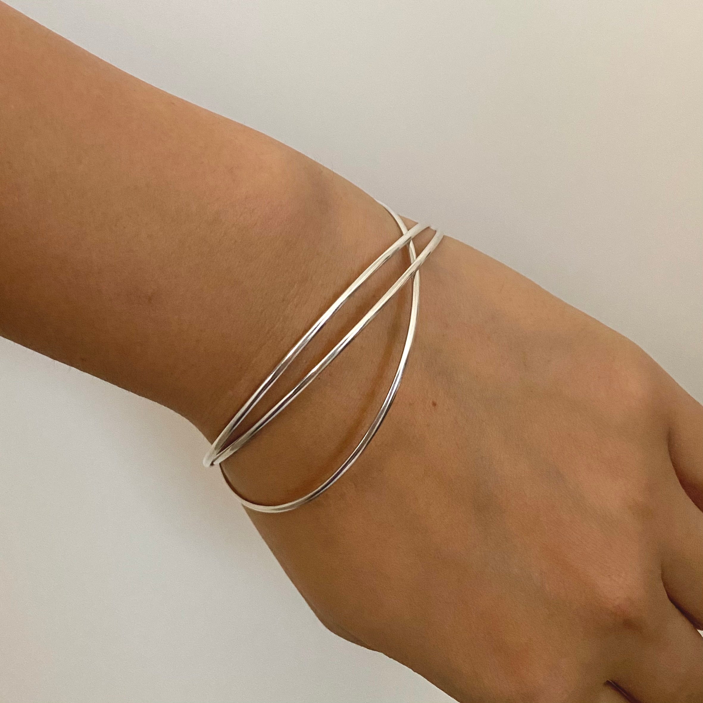 Intertwined Silver Bangle