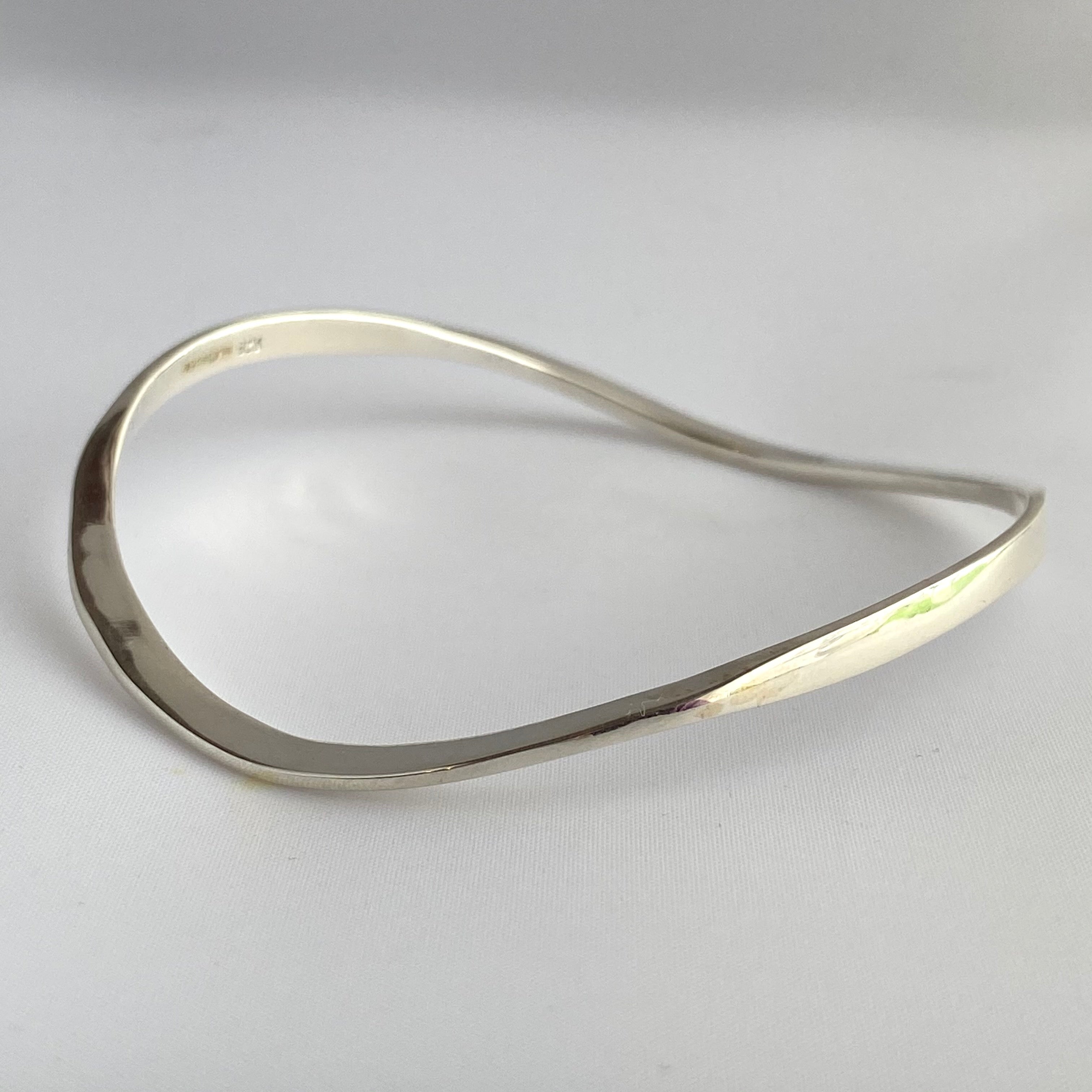 Sterling Silver Wavy Bangle with a Slightly Triangular Shape